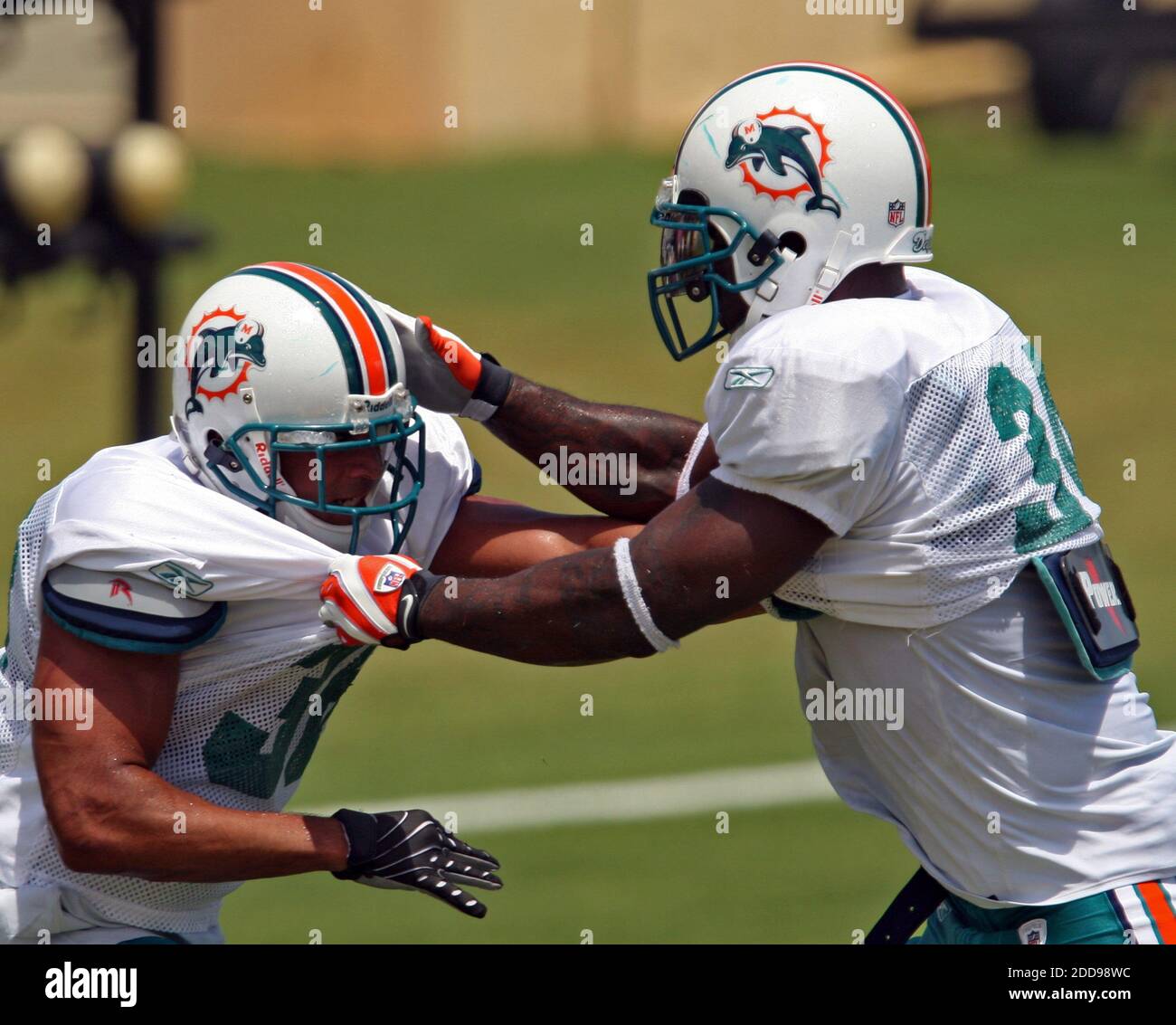 Miami Dolphins RB Ricky Williams (34) runs during practice at the