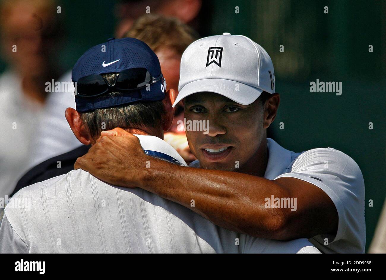 NO FILM, NO VIDEO, NO TV, NO DOCUMENTARY USA's Tiger Woods embraced