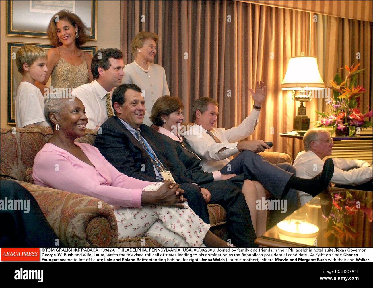 NO FILM, NO VIDEO, NO TV, NO DOCUMENTARY - © TOM GRALISH/KRT/ABACA. 19942-8. PHILADELPHIA, PENNSYLVANIA, USA, 03/08/2000. Joined by family and friends in their Philadelphia hotel suite, Texas Governor George W. Bush and wife, Laura, watch the televised roll call of states leading to his nomination Stock Photo