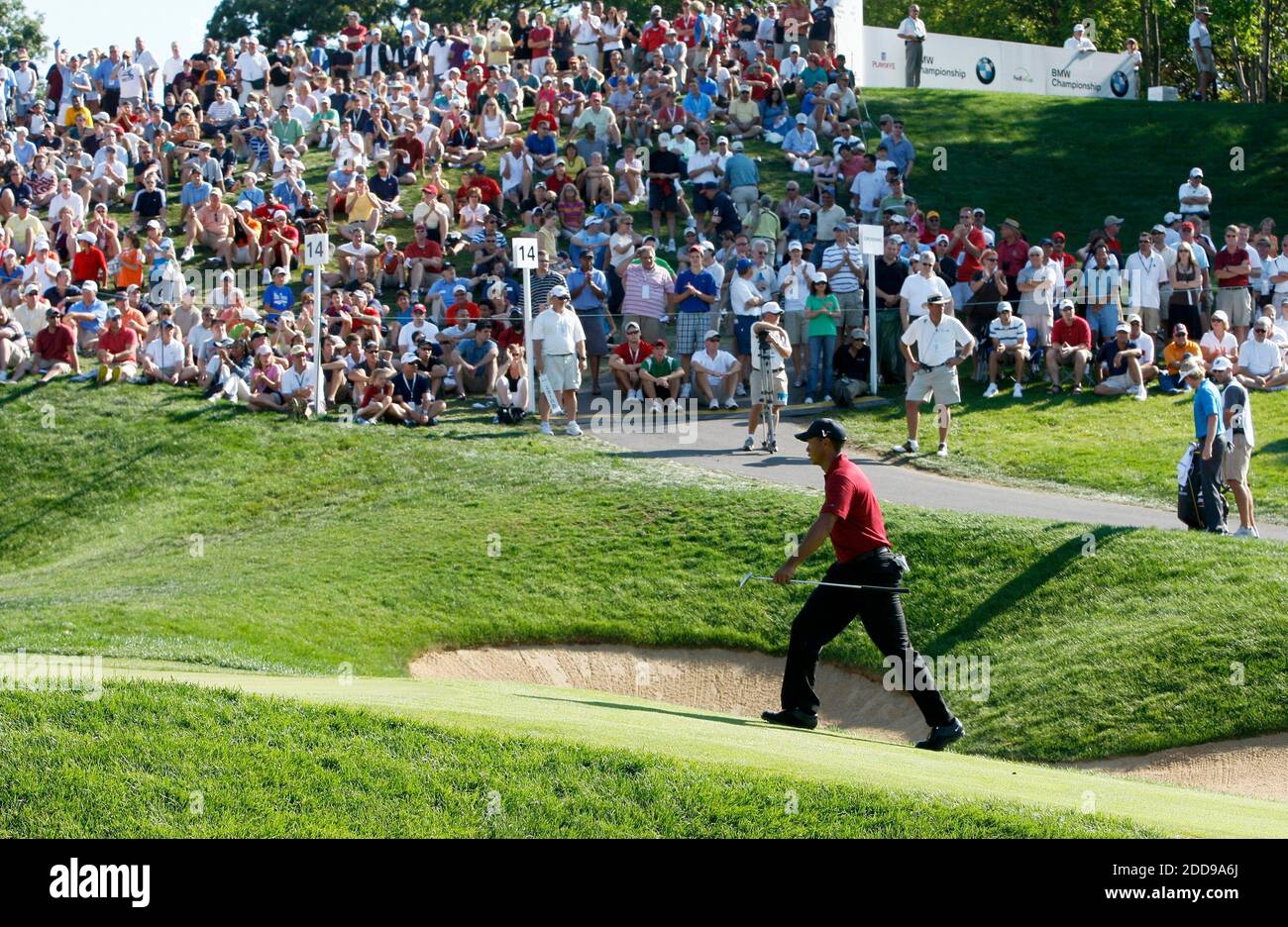 NO FILM, NO VIDEO, NO TV, NO DOCUMENTARY - Tiger Woods approaches the 14th  hole in the final round of the 2009 BMW Championship at Cog Hill Golf &  Country Club in