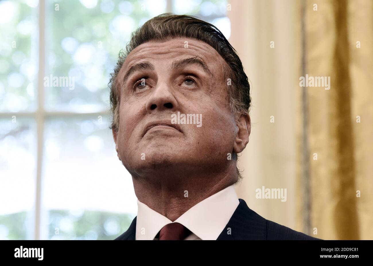 Actor Sylvester Stallone looks on during a signing ceremony to grant of Clemency for former heavyweight champion Jack Johnson in the Oval Office of the White House on May 24, 2018 in Washington, DC. Photo by Olivier Douliery/ Abaca Press Stock Photo