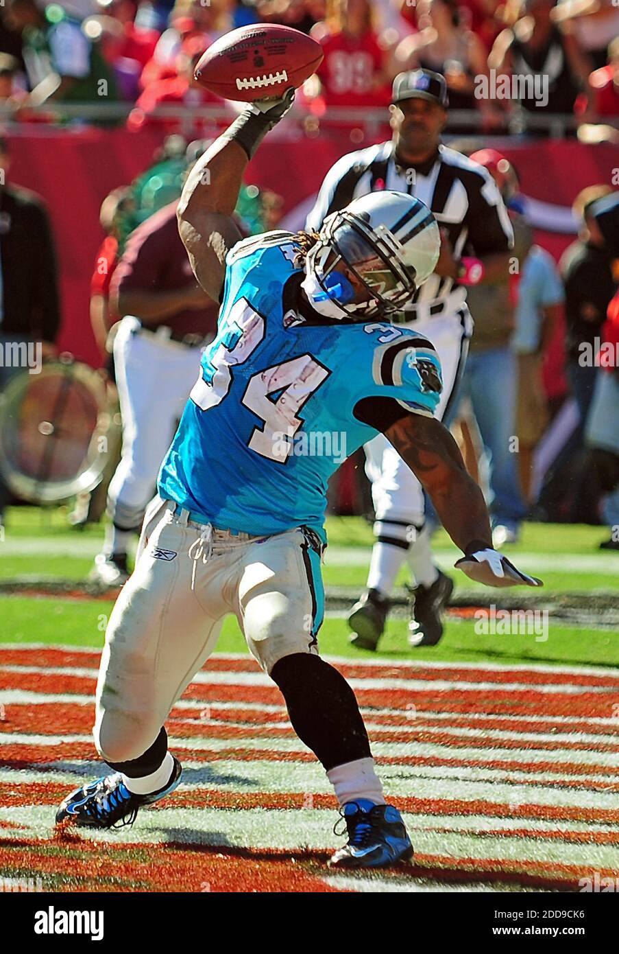 NO FILM, NO VIDEO, NO TV, NO DOCUMENTARY - Carolina Panthers running back DeAngelo Williams (34) spikes the football after scoring a touchdown against the Tampa Bay Buccaneers in fourth-quarter action at Raymond James Stadium in Tampa, FL, USA on October 18, 2009. The Panthers defeated the Buccaneers, 28-21. Photo by Jeff Siner/Charlotte Observer/MCT/Cameleon/ABACAPRESS.COM Stock Photo