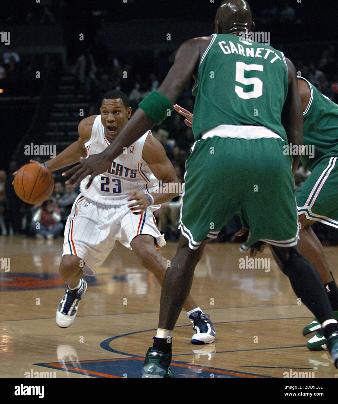 NO FILM, NO VIDEO, NO TV, NO DOCUMENTARY - Charlotte Bobcats' Stephen Graham (23) drives the ball to the basket against Boston Celtics' Kevin Garrett during NBA action in Charlotte, NC, USA on December 1, 2009. Photo by T. Ortega Gaines/Charlotte Observer/MCT/Cameleon/ABACAPRESS.COM Stock Photo