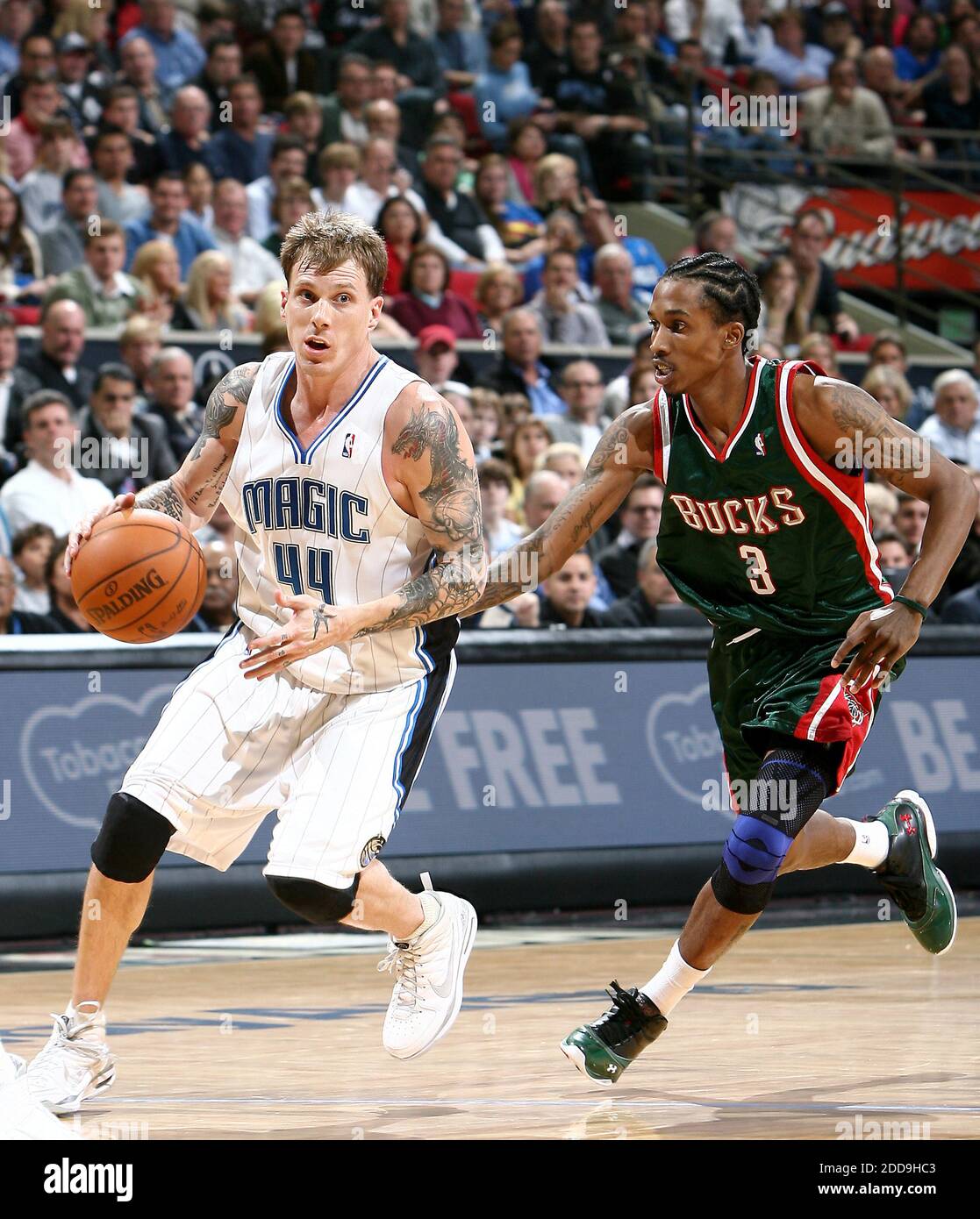 Milwaukee Bucks Brandon Jennings 3 dribbles the ball up court