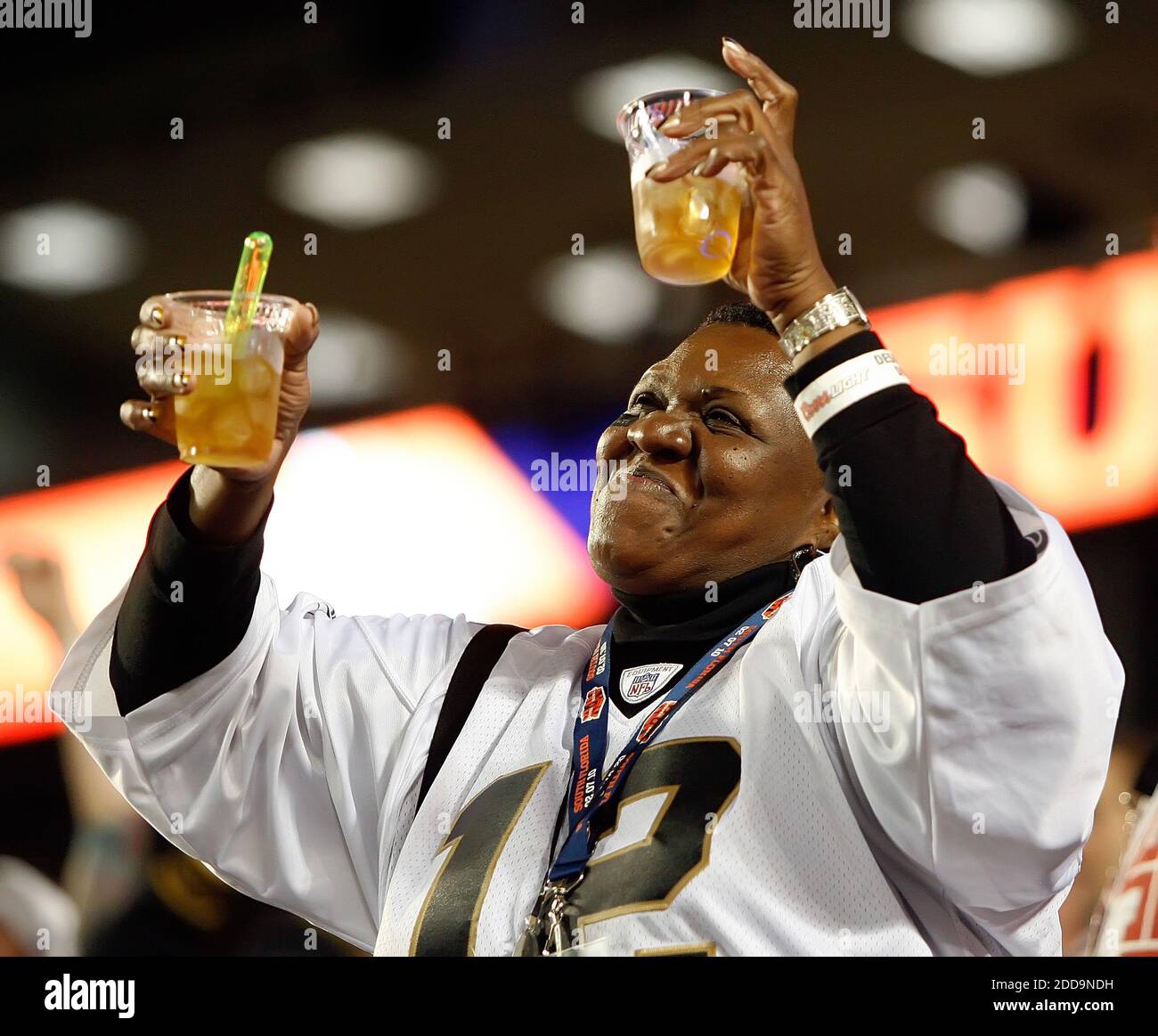 NO FILM, NO VIDEO, NO TV, NO DOCUMENTARY - A Saints fan celebrates in the end zone in Super Bowl XLIV at Sun Life Stadium in Miami Gardens, FL, USA on February 7, 2010. The New Orleans Saints beat the Indianapolis Colts 31-17 Photo by Gary Green/Orlando Sentinel/MCT/Cameleon/ABACAPRESS.COM Stock Photo