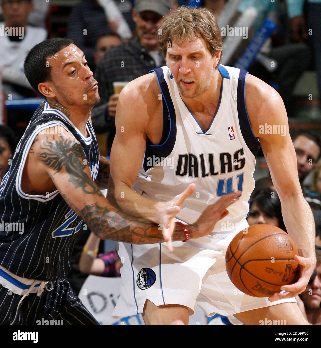 NO FILM, NO VIDEO, NO TV, NO DOCUMENTARY - Dallas Mavericks' Dirk Nowitzki (41) fends off Matt Barnes of the Orlando Magic in NBA action at Amway Arena in Orlando, Florida, on Friday, February 19, 2010. Dallas defeated Orlando, 95-85. Photo by Gary W. Green/Orlando Sentinel/MCT/Cameleon/ABACAPRESS.COM Stock Photo