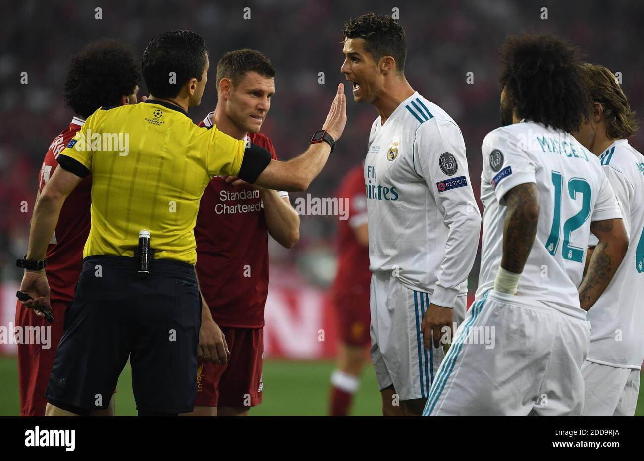 26 May 2018, Ukraine, Kiev: Champions League, Real Madrid vs FC Liverpool, finals at the Olimpiyskiy National Sports Complex. Madrid's Cristiano Ronaldo (C) in discussion with referee Milorad Mazic (L). Liverpool's James Milner is standing beside them. Photo by Ina Fassbender/DPA/ABACAPRESS.COM Stock Photo