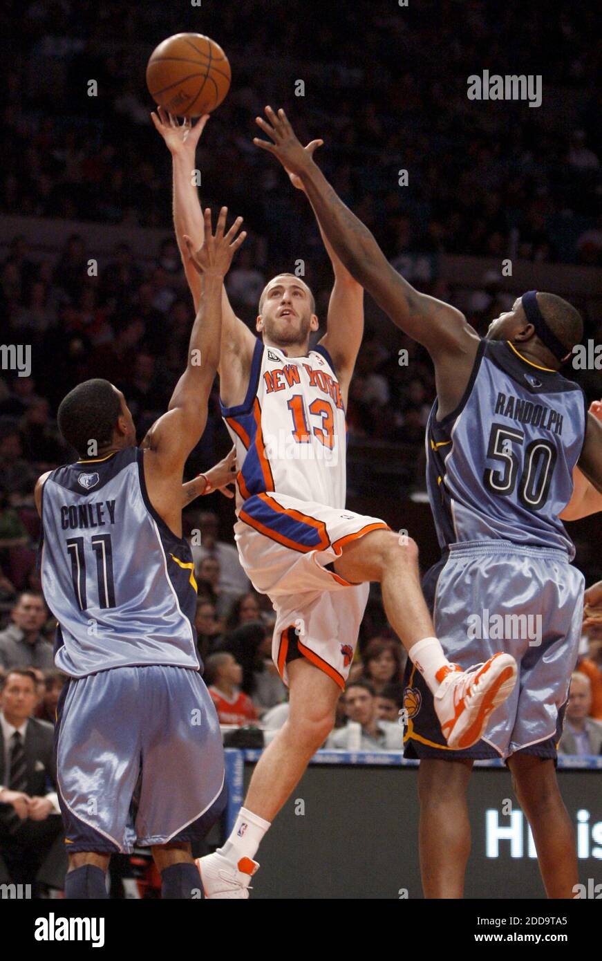 NO FILM, NO VIDEO, NO TV, NO DOCUMENTARY - New York Knicks' Sergio Rodriguez (13) shoots against Memphis Grizzlies' Mike Conley (left) and Zach Randolph during NBA basketball action at Madison Square Garden in New York on Saturday, February 27, 2010. Photo by Jason DeCrow/Newsday/MCT/Cameleon/ABACAPRESS.COM Stock Photo
