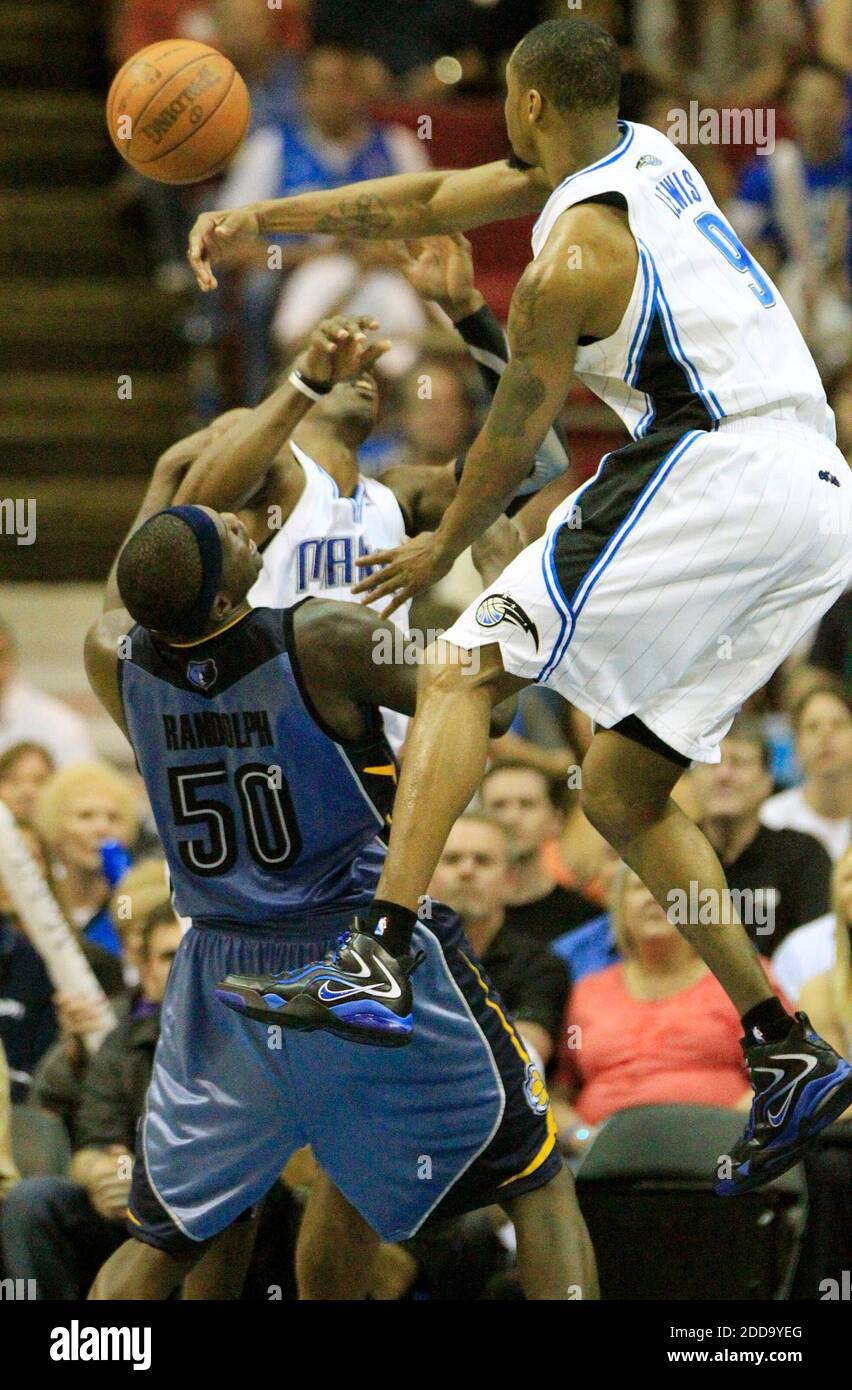 NO FILM, NO VIDEO, NO TV, NO DOCUMENTARY - Orlando Magic forward Rashard Lewis towers over Memphis grizzlies forward Zach Randolph to block his shot during an NBA game at Amway Arena in Orlando, FL, USA on April 4, 2010. Photo by Stephen M. Dowell/Orlando Sentinel/MCT/Cameleon/ABACAPRESS.COM Stock Photo