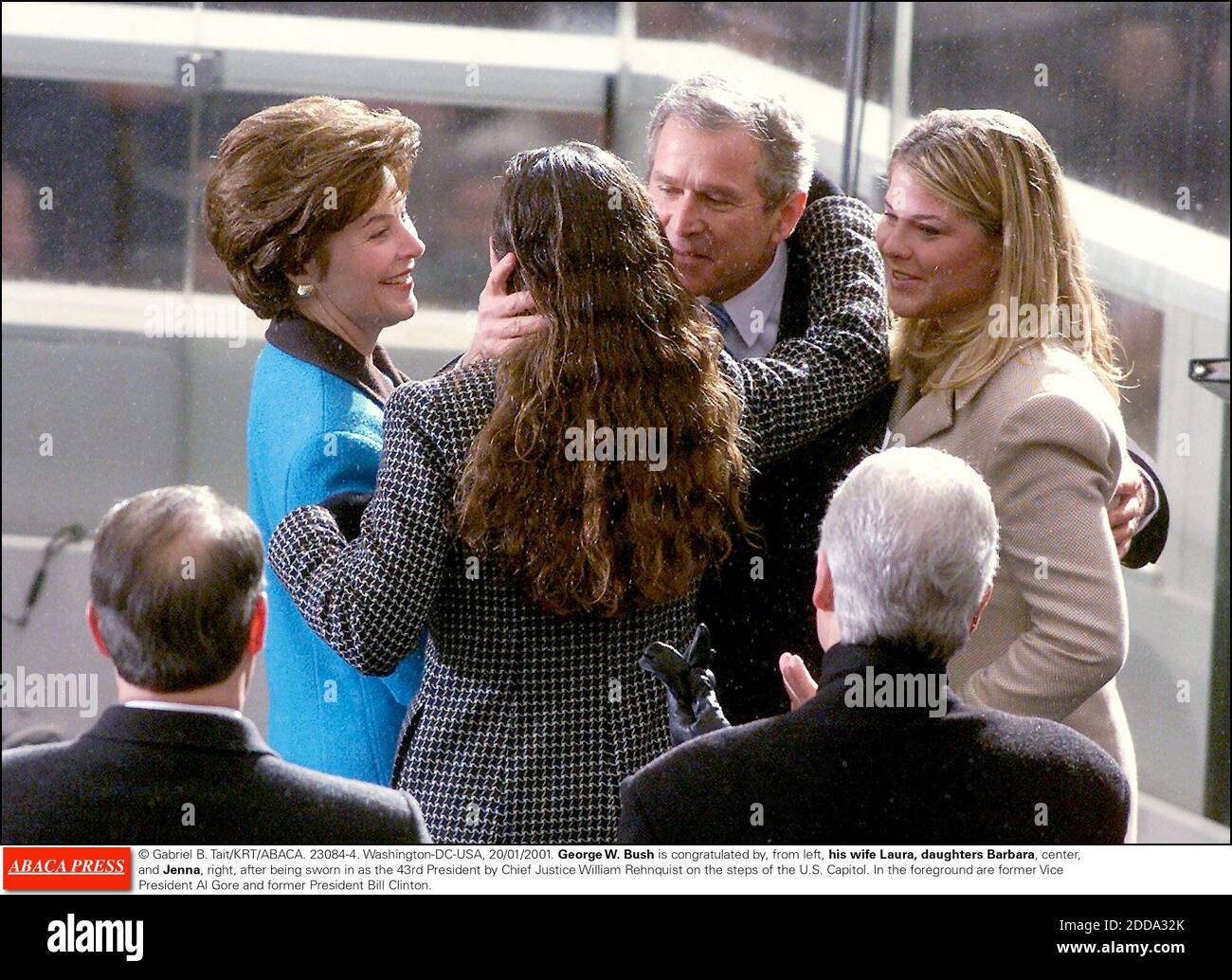 NO FILM, NO VIDEO, NO TV, NO DOCUMENTARY - © Gabriel B. Tait/KRT/ABACA. 23084-4. Washington-DC-USA, 20/01/2001. George W. Bush is congratulated by, from left, his wife Laura, daughters Barbara, center, and Jenna, right, after being sworn in as the 43rd President by Chief Justice William Rehnquist Stock Photo