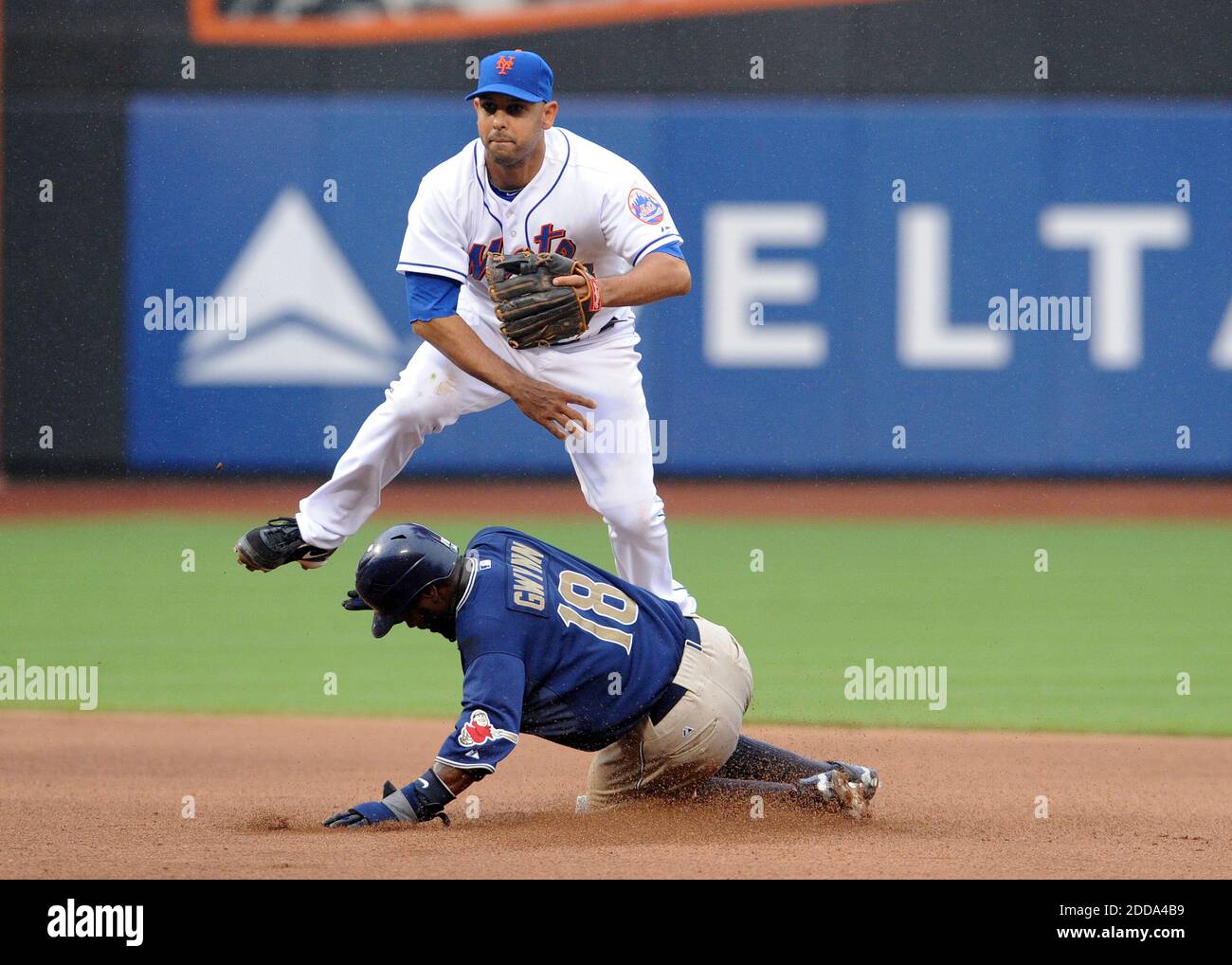 NO FILM, NO VIDEO, NO TV, NO DOCUMENTARY - New York Mets second baseman Alex Cora (13) completes a double play in the top of the seventh inning during the MLB Baseball match, New York Mets vs San Diego Padres at CitiField in New York City, USA on June 10, 2010. Photo by Christopher Pasatieri/MCT/ABACAPRESS.COM Stock Photo