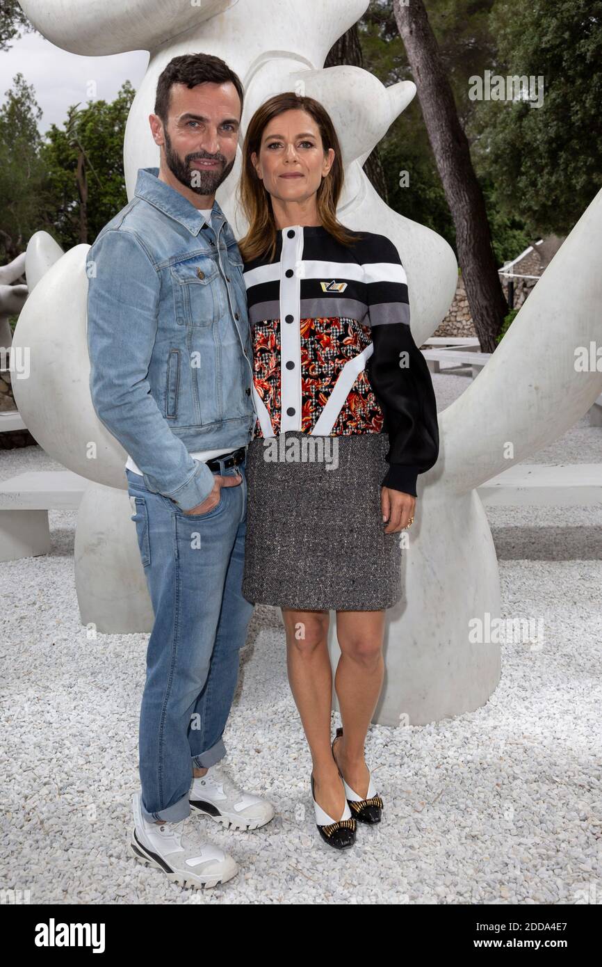 Marina Fois poses with Nicolas Ghesquiere after the Louis Vuitton