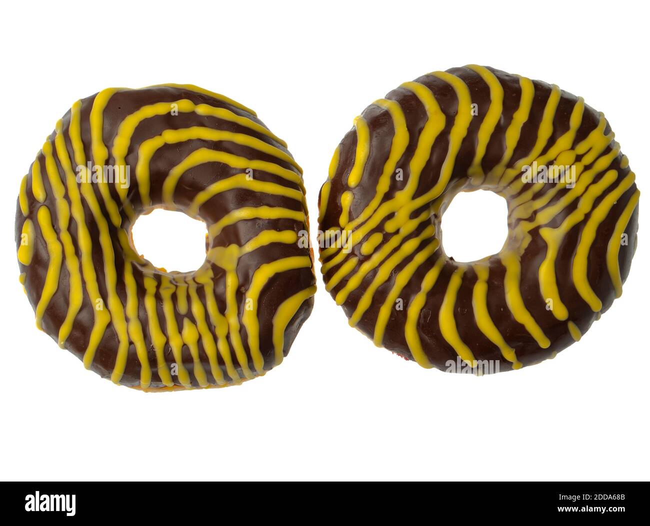 Two American donuts covered with chocolate and with yellow stripes on a white background Stock Photo