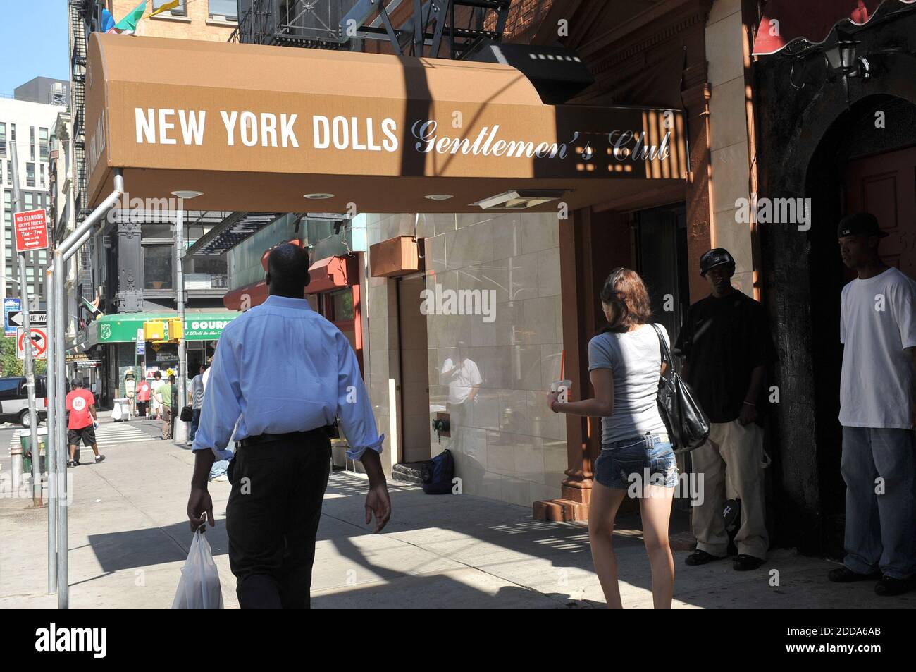 NO FILM, NO VIDEO, NO TV, NO DOCUMENTARY - People walk past the New York Dolls Gentlemen's Club near ground zero in New York, NY, USA on August 19, 2010. Photo by Diane Bondareff/MCT/ABACAPRESS.COM Stock Photo