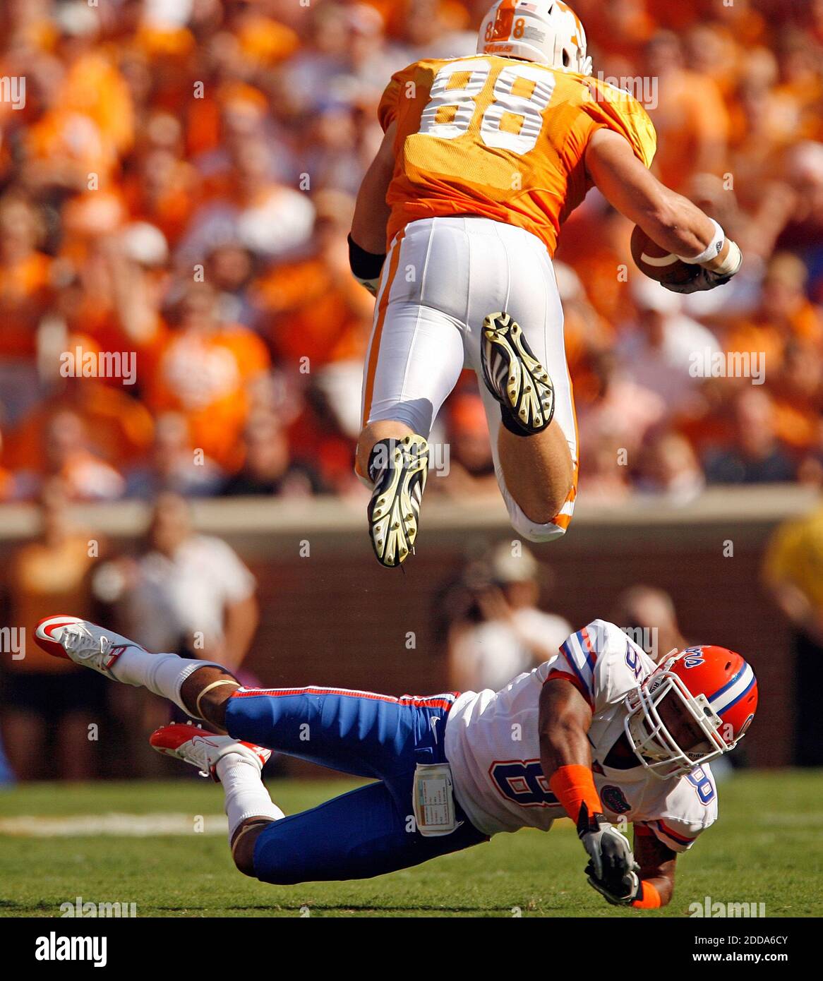 NO FILM, NO VIDEO, NO TV, NO DOCUMENTARY - Tennessee tight end Luke Stocker (88) jumps over Florida cornerback Jeremy Brown (8) during NCAA Football match, Tennessee Volunteers vs Florida Gators at Neyland Stadium in Knoxville, USA on September 18, 2010. The Gators won 31-17. Photo by Gary W. Green/MCT/Cameleon/ABACAPRESS.COM Stock Photo