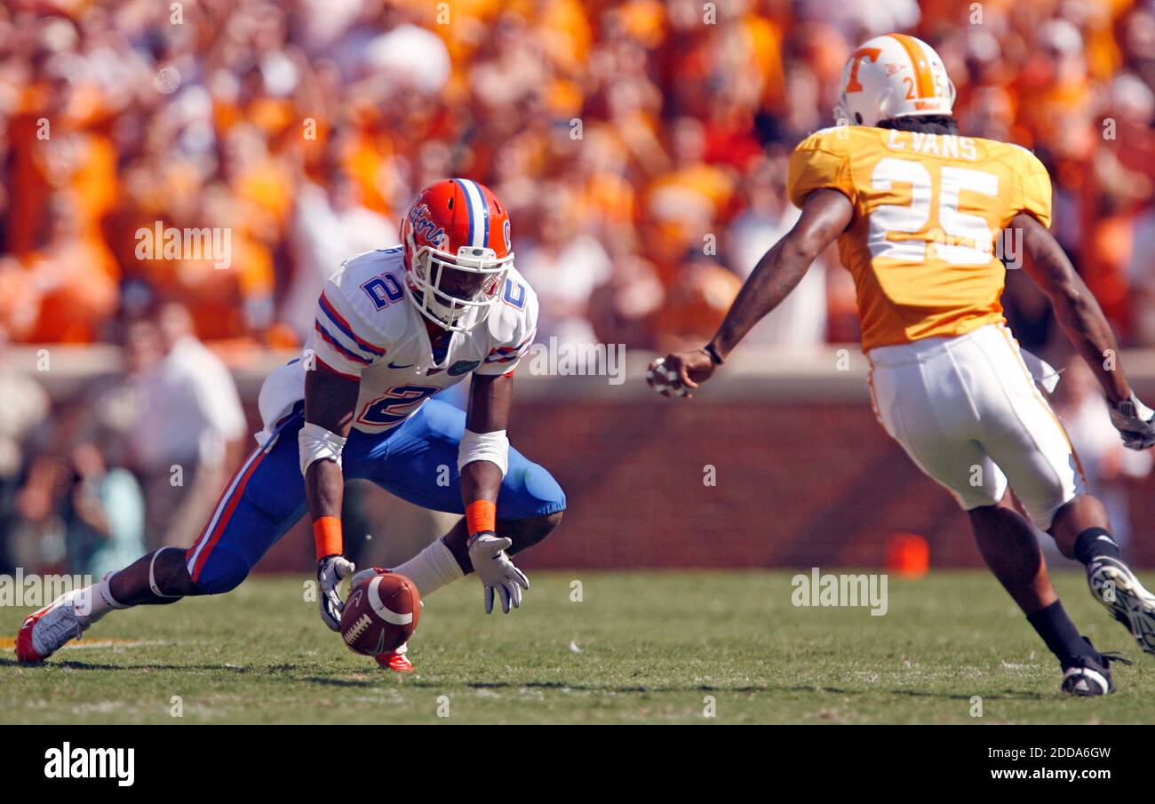 NO FILM, NO VIDEO, NO TV, NO DOCUMENTARY - Florida running back Jeff Demps (2) recovers his own fumble in front of Tennessee defensive back Art Evans (25) during NCAA Football match, Tennessee Volunteers vs Florida Gators at Neyland Stadium in Knoxville, USA on September 18, 2010. The Gators won 31-17. Photo by Gary W. Green/MCT/Cameleon/ABACAPRESS.COM Stock Photo