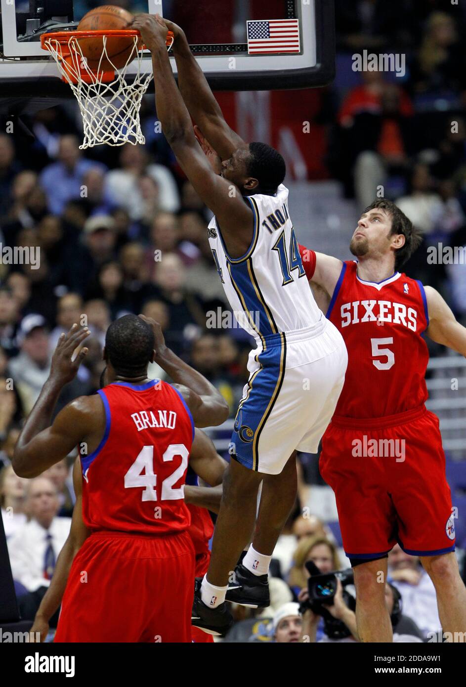 NO FILM, NO VIDEO, NO TV, NO DOCUMENTARY - The Washington Wizards' Al Thornton (14) dunks over three Philadelphia 76ers defenders during the first quarter at the Verizon Center in Washington, DC, USA on November 2, 2010. Photo by Chuck Myers/MCT/ABACAPRESS.COM Stock Photo