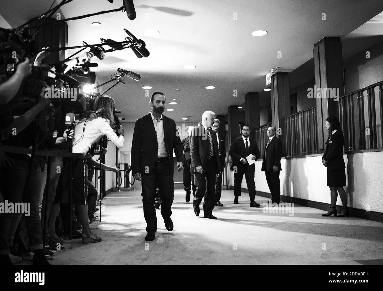 Former Elysee senior security officer Alexandre Benalla leaves in a media frenzy after his appearance before a Senate committee in Paris, France, on September 19, 2018. The disgraced former bodyguard at the centre of the biggest scandal of Emmanuel Macron's young presidency appeared before a Senate committee which will quiz him over his close ties to France's maverick leader. Benalla made global headlines in July after Le Monde newspaper revealed him as the man filmed roughing up demonstrators at a May Day rally in Paris, posing as a police officer with a police helmet and armband. Photo by El Stock Photo