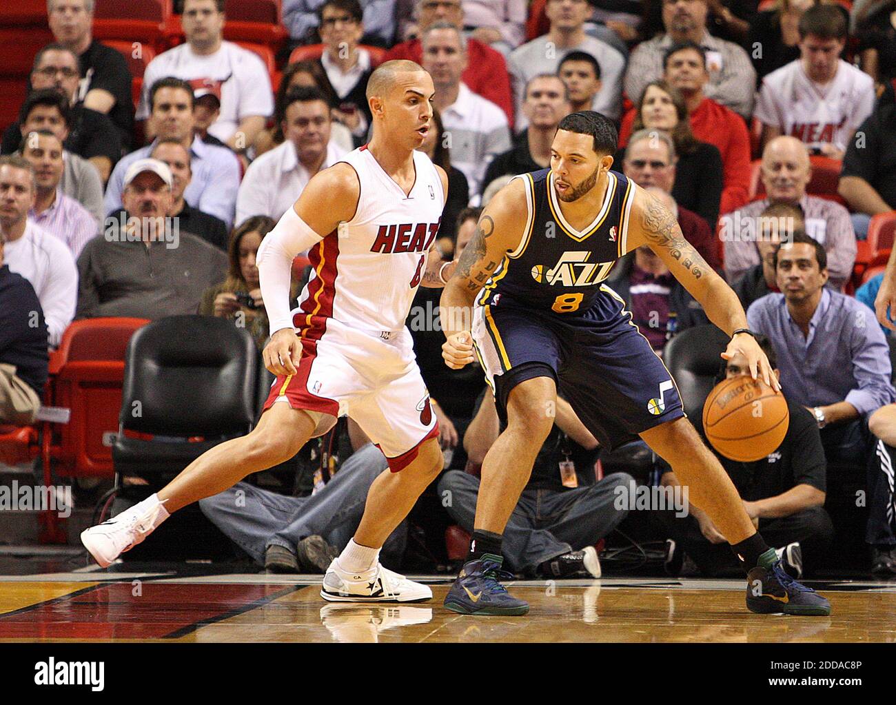 NO FILM, NO VIDEO, NO TV, NO DOCUMENTARY - Utah Jazz' Deron Williams,  right, drives to the basket during the NBA Basketball match, Miami Heat vs  Utah Jazz at American Airlines Arena