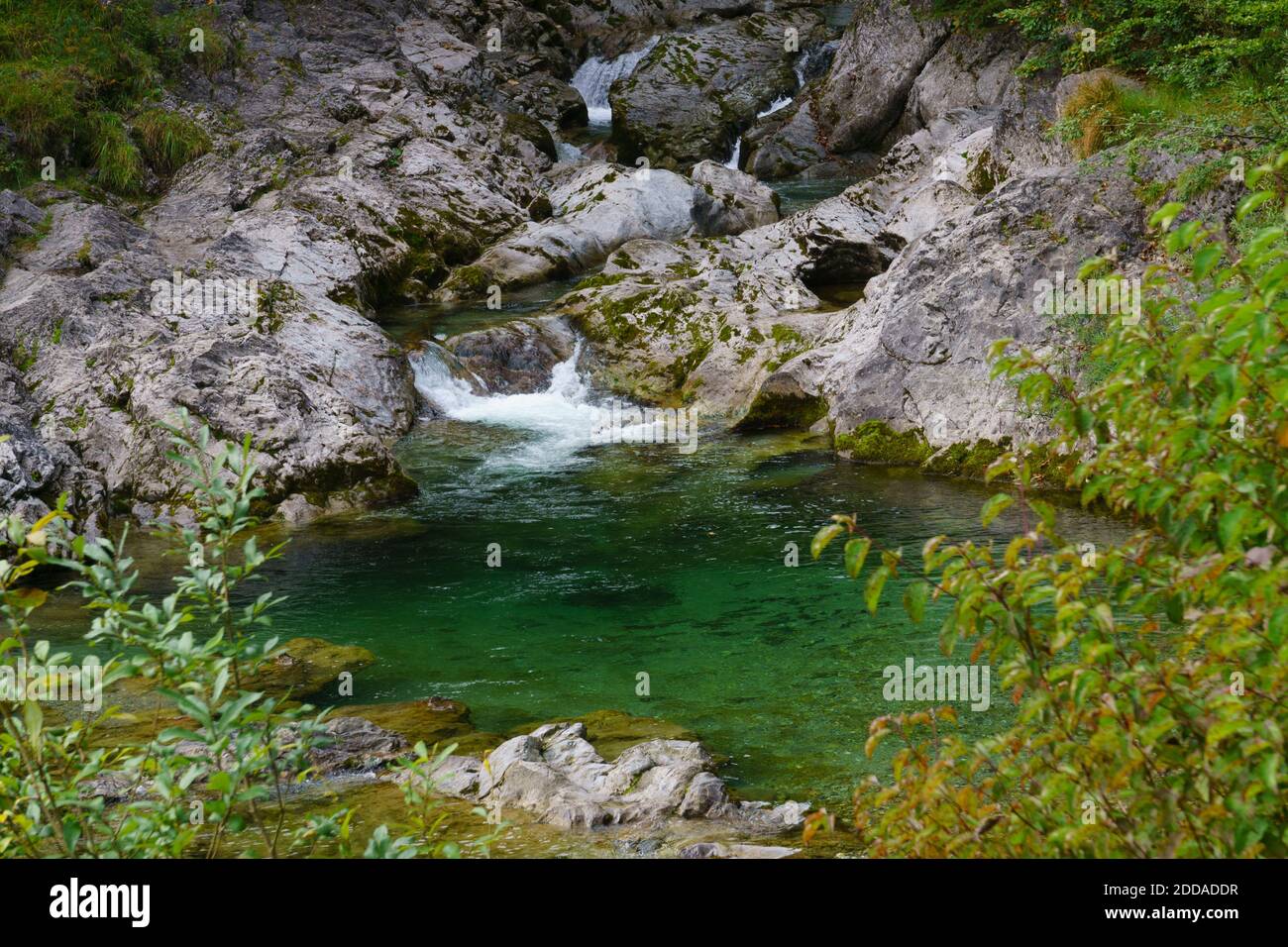 Small waterfall on Weissach river Stock Photo