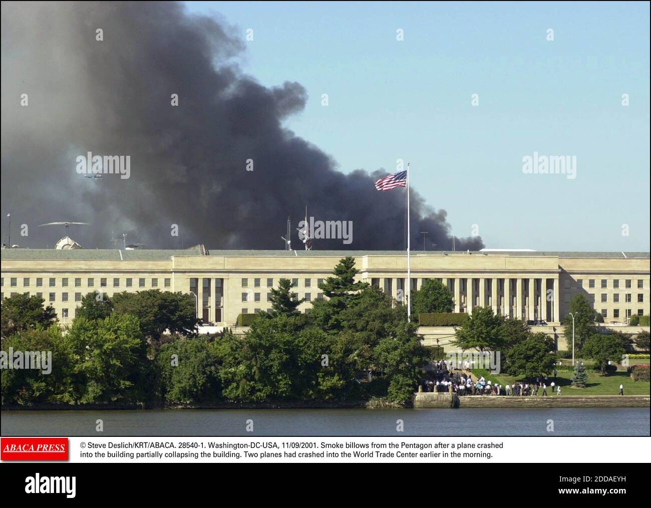 NO FILM, NO VIDEO, NO TV, NO DOCUMENTARY - © Steve Deslich/KRT/ABACA. 28540-1. Washington-DC-USA, 11/09/2001. Smoke billows from the Pentagon after a plane crashed into the building partially collapsing the building. Two planes had crashed into the World Trade Center earlier in the morning. Stock Photo