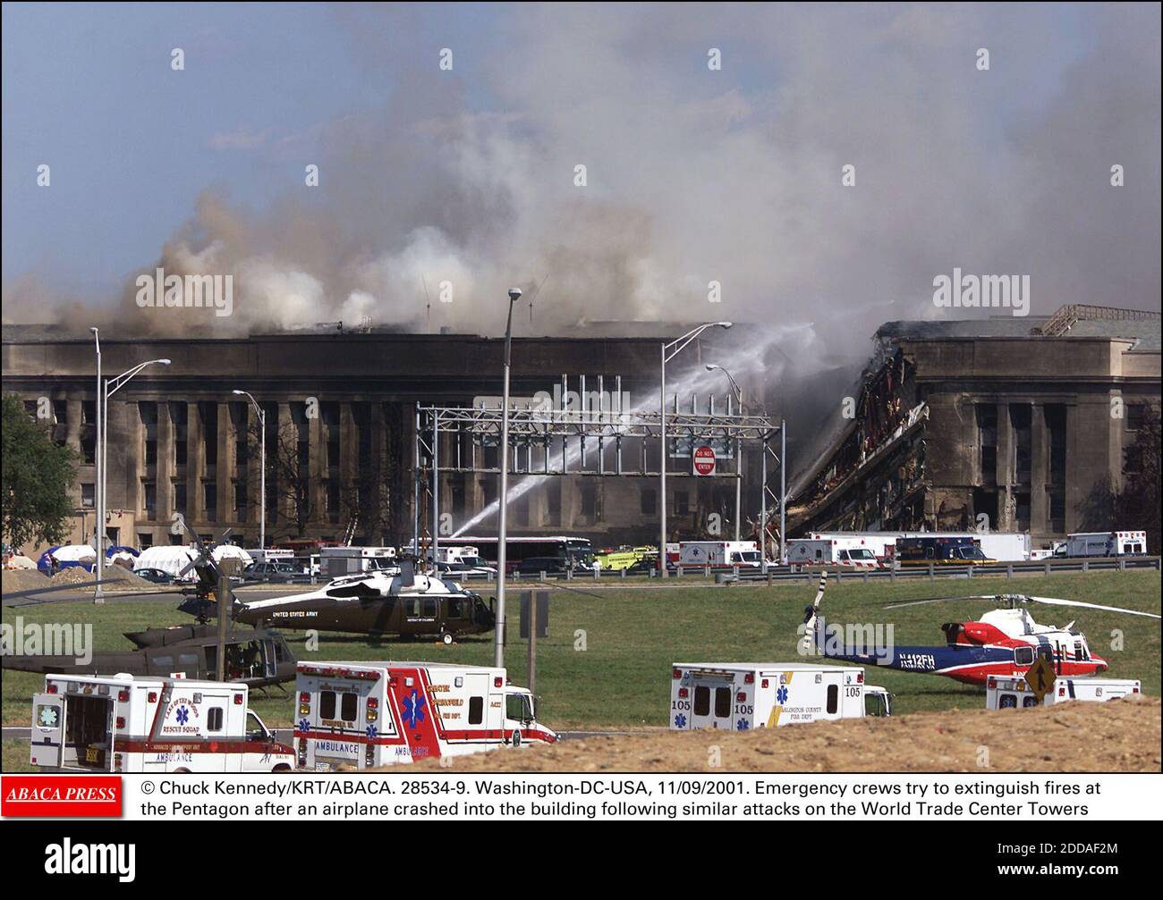 NO FILM, NO VIDEO, NO TV, NO DOCUMENTARY - © Chuck Kennedy/KRT/ABACA. 28534-9. Washington-DC-USA, 11/09/2001. Emergency crews try to extinguish fires at the Pentagon after an airplane crashed into the building following similar attacks on the World Trade Center Towers Stock Photo