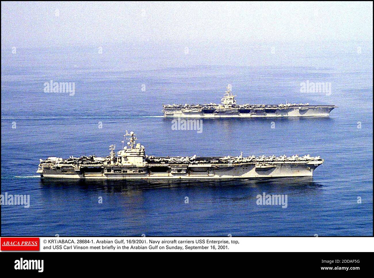 NO FILM, NO VIDEO, NO TV, NO DOCUMENTARY - © KRT/ABACA. 28684-1. Arabian Gulf, 16/9/2001. Navy aircraft carriers USS Enterprise, top, and USS Carl Vinson meet briefly in the Arabian Gulf on Sunday, September 16, 2001. Stock Photo