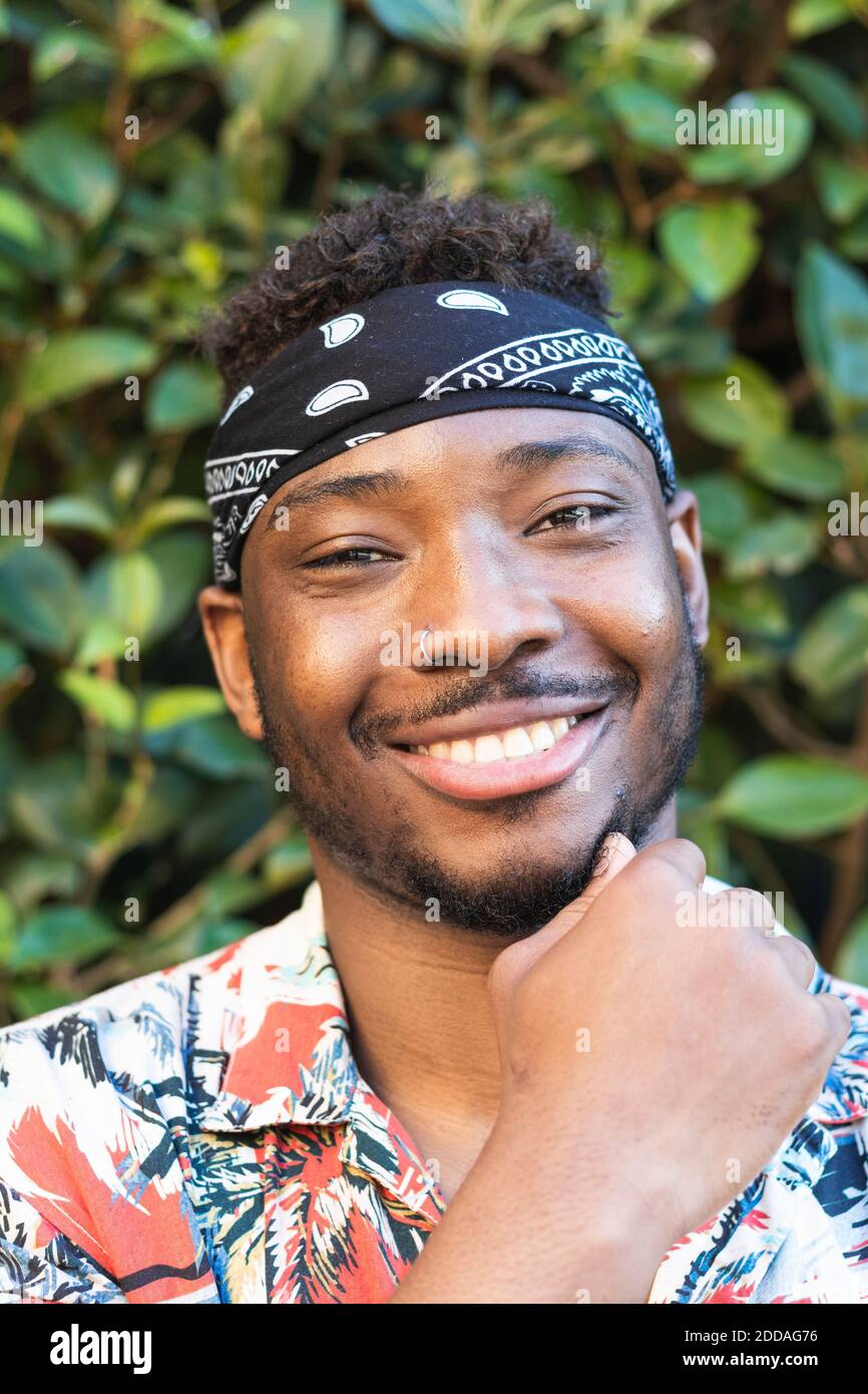 Smiling man wearing bandana hi-res stock photography and images - Alamy