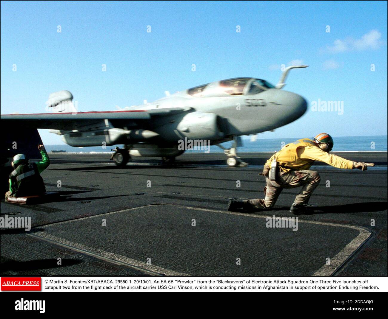 NO FILM, NO VIDEO, NO TV, NO DOCUMENTARY - © Martin S. Fuentes/KRT/ABACA. 29550-1. 20/10/01. An EA-6B Prowler from the Blackravens of Electronic Attack Squadron One Three Five launches off catapult two from the flight deck of the aircraft carrier USS Carl Vinson, which is conducting missions in Af Stock Photo