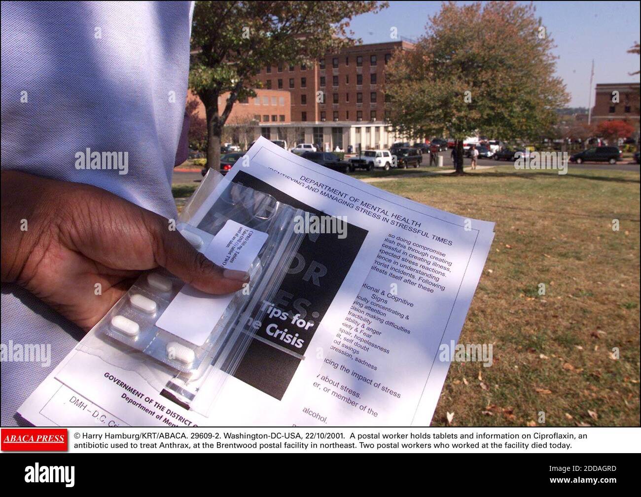 NO FILM, NO VIDEO, NO TV, NO DOCUMENTARY - © Harry Hamburg/KRT/ABACA. 29609-2. Washington-DC-USA, 22/10/2001. A postal worker holds tablets and information on Ciproflaxin, an antibiotic used to treat Anthrax, at the Brentwood postal facility in northeast. Two postal workers who worked at the facil Stock Photo