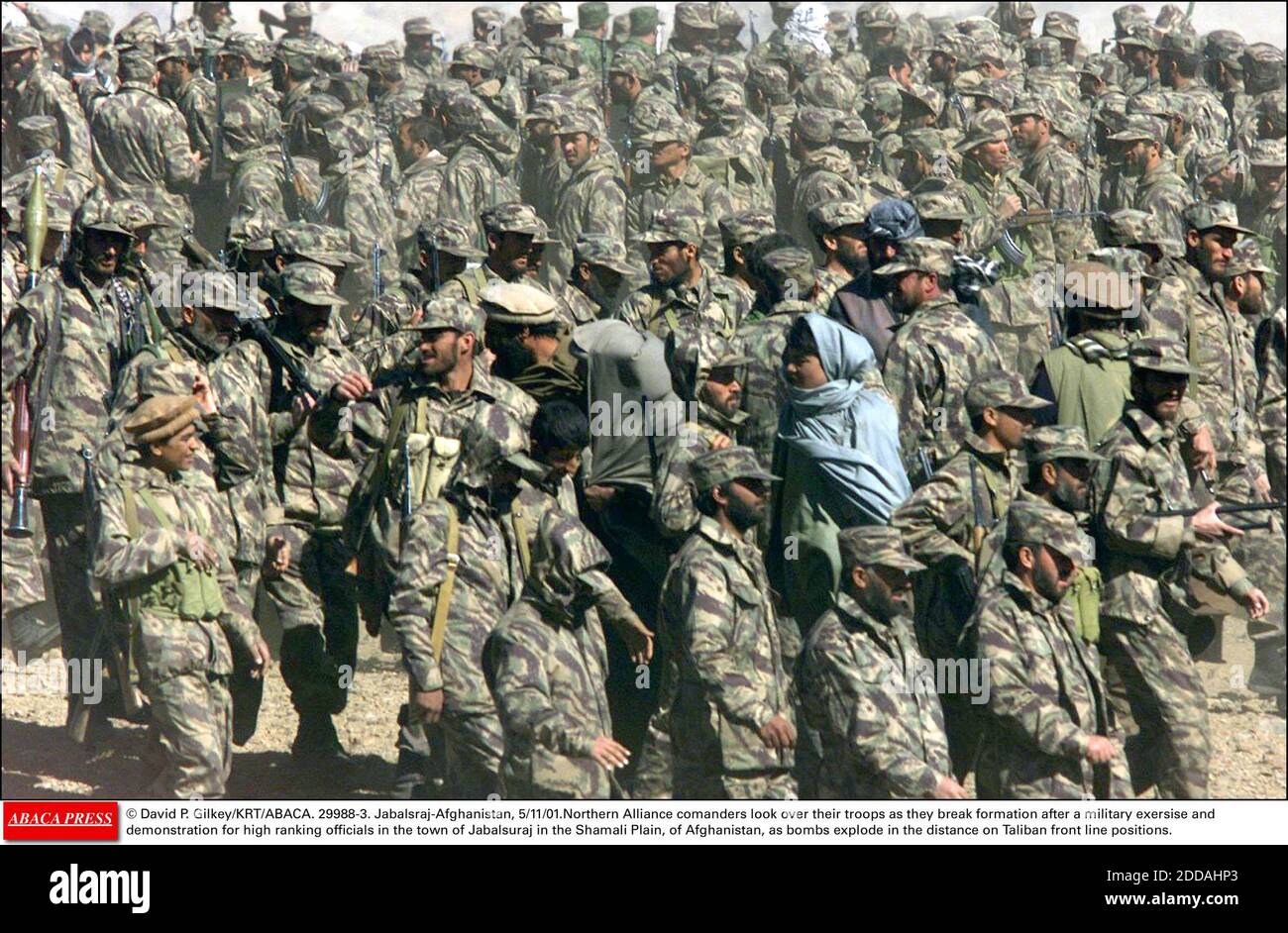 NO FILM, NO VIDEO, NO TV, NO DOCUMENTARY - © David P. Gilkey/KRT/ABACA. 29988-3. Jabalsraj-Afghanistan, 5/11/01. Northern Alliance comanders look over their troops as they break formation after a military exersise and demonstration for high ranking officials in the town of Jabalsuraj in the Shamal Stock Photo