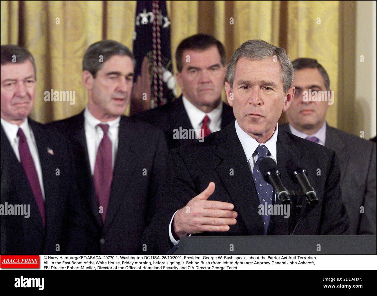 NO FILM, NO VIDEO, NO TV, NO DOCUMENTARY - © Harry Hamburg/KRT/ABACA. 29770-1. Washington-DC-USA, 26/10/2001. President George W. Bush speaks about the Patriot Act Anti-Terrorism bill in the East Room of the White House, Friday morning, before signing it. Behind Bush (from left to right) are: Atto Stock Photo