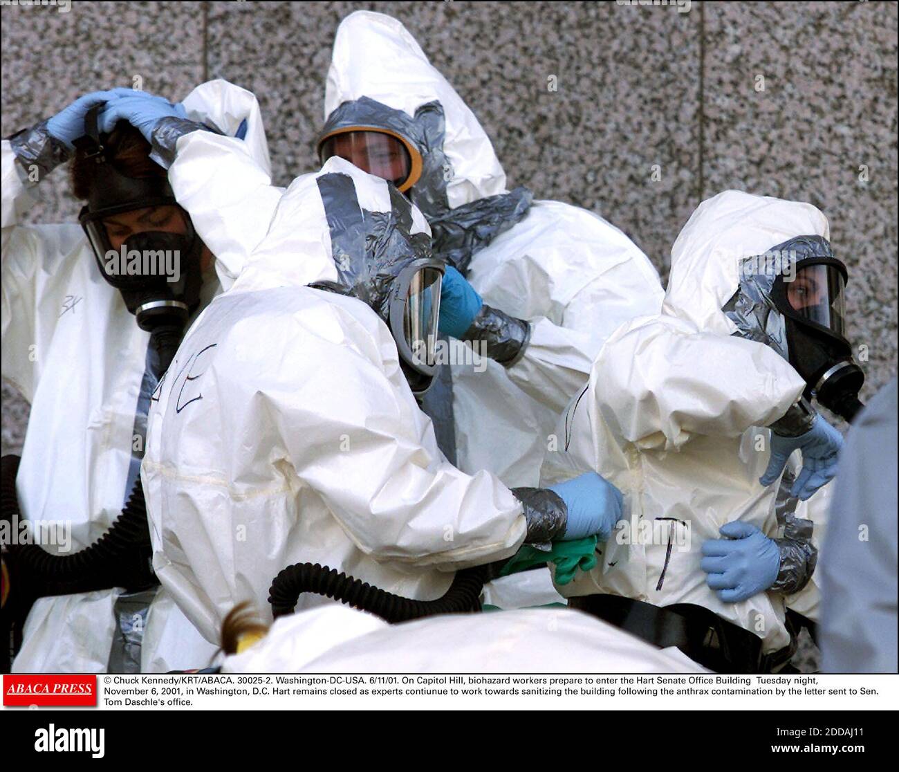 NO FILM, NO VIDEO, NO TV, NO DOCUMENTARY - © Chuck Kennedy/KRT/ABACA. 30025-2. Washington-DC-USA. 6/11/01. On Capitol Hill, biohazard workers prepare to enter the Hart Senate Office Building Tuesday night, November 6, 2001, in Washington, D.C. Hart remains closed as experts continue to work toward Stock Photo