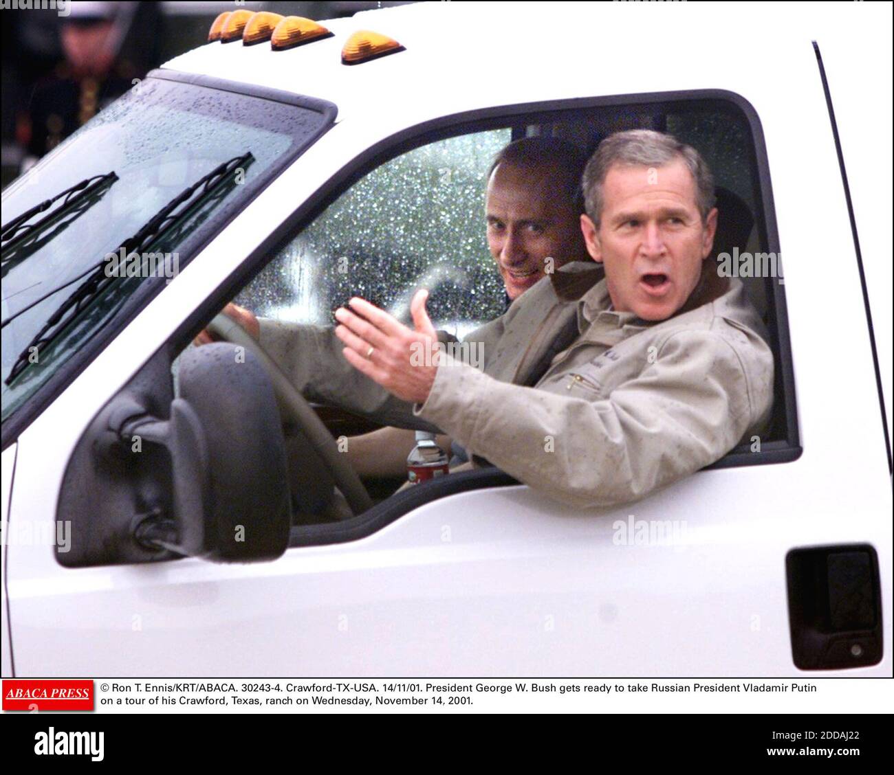 NO FILM, NO VIDEO, NO TV, NO DOCUMENTARY - © Ron T. Ennis/KRT/ABACA.  30243-4. Crawford-TX-USA. 14/11/01. President George W. Bush gets ready to  take Russian President Vladamir Putin on a tour of