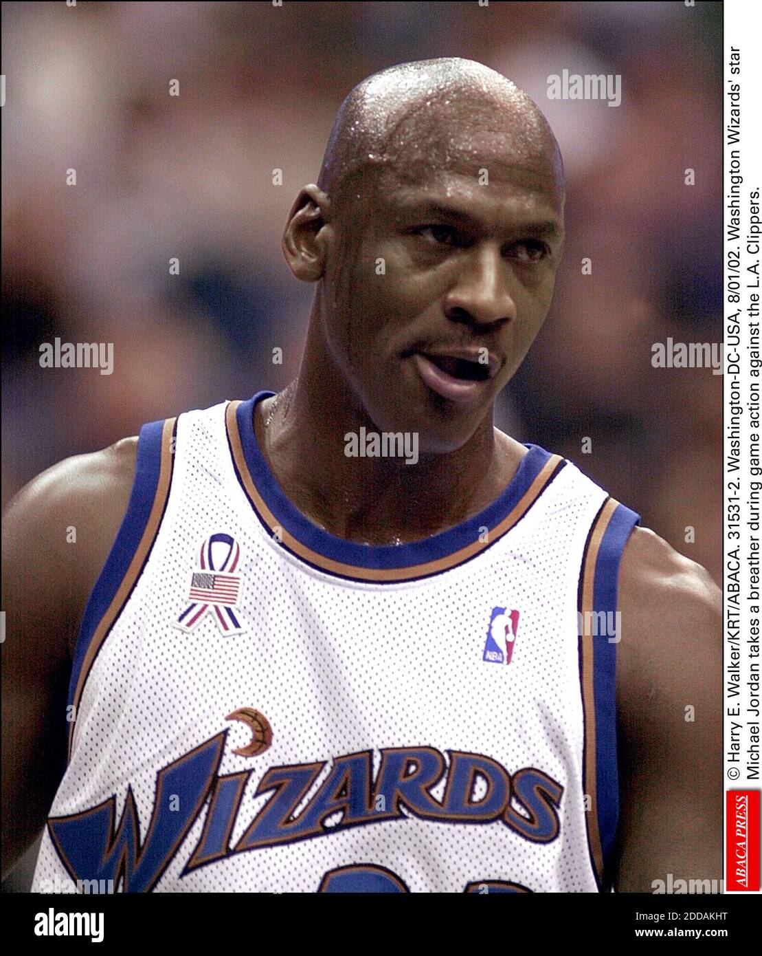 NO FILM, NO VIDEO, NO TV, NO DOCUMENTARY - © Harry E. Walker/KRT/ABACA.  31531-2. Washington-DC-USA, 8/01/02. Washington Wizards' star Michael Jordan  takes a breather during game action against the Los Angeles Clippers