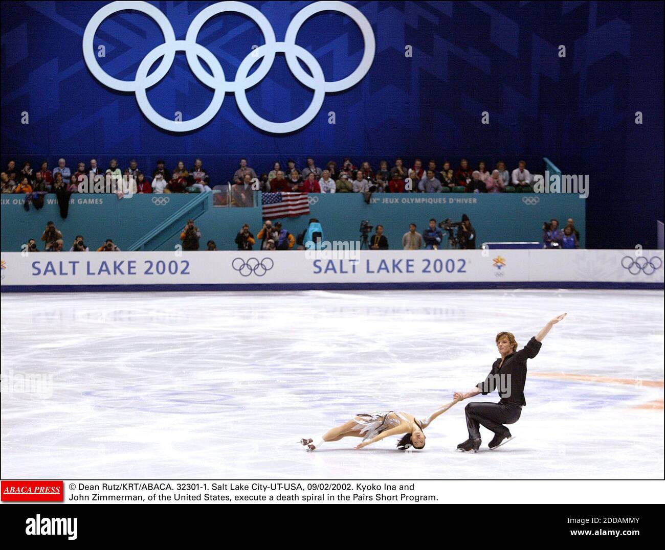 NO FILM, NO VIDEO, NO TV, NO DOCUMENTARY - © Dean Rutz/KRT/ABACA. 32301-1. Salt Lake City-UT-USA, 09/02/2002. Kyoko Ina and John Zimmerman, of the United States, execute a death spiral in the Pairs Short Program. Stock Photo