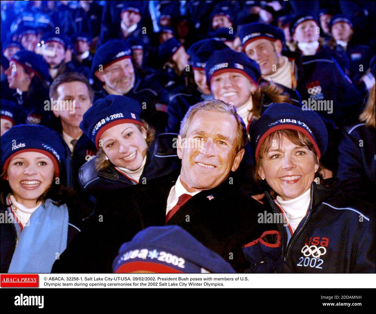 NO FILM, NO VIDEO, NO TV, NO DOCUMENTARY - © ABACA. 32258-1. Salt Lake City-UT-USA. 09/02/2002. President Bush poses with members of U.S. Olympic team during opening ceremonies for the 2002 Salt Lake City Winter Olympics. Stock Photo