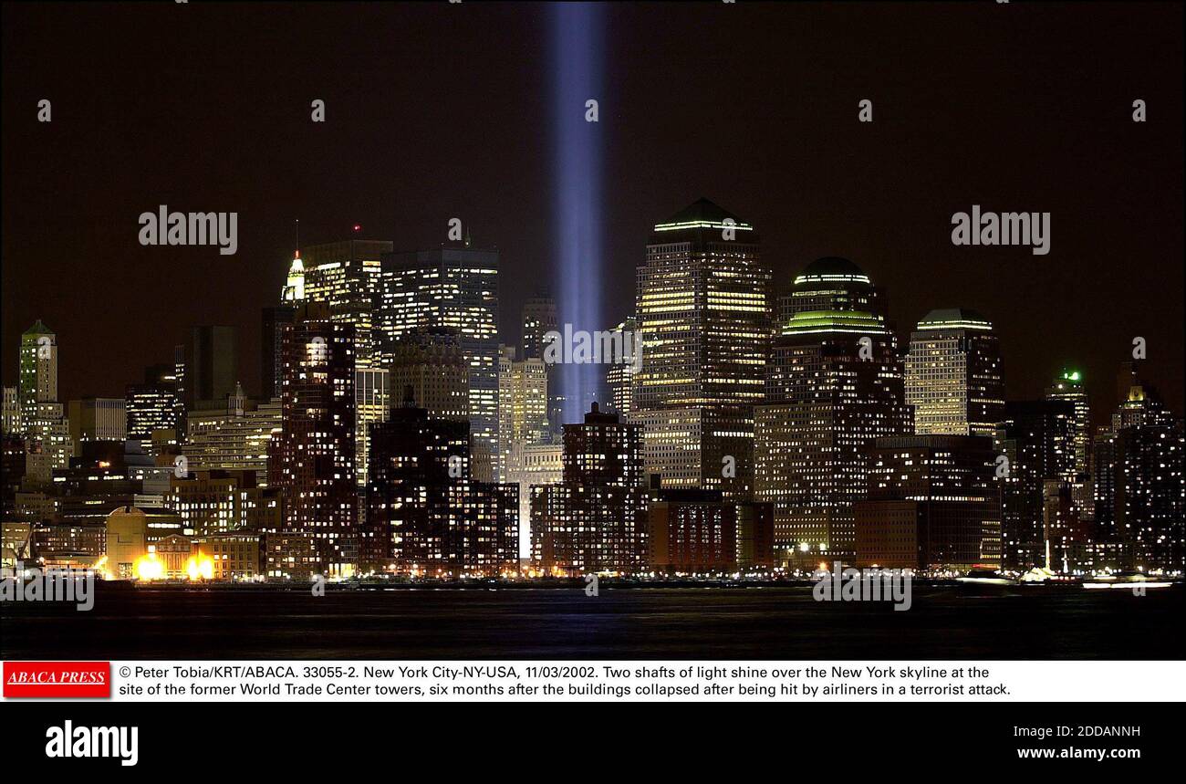NO FILM, NO VIDEO, NO TV, NO DOCUMENTARY - © Peter Tobia/KRT/ABACA. 33055-2. New York City-NY-USA, 11/03/2002. Two shafts of light shine over the New York skyline at the site of the former World Trade Center towers, six months after the buildings collapsed after being hit by airliners in a terrori Stock Photo