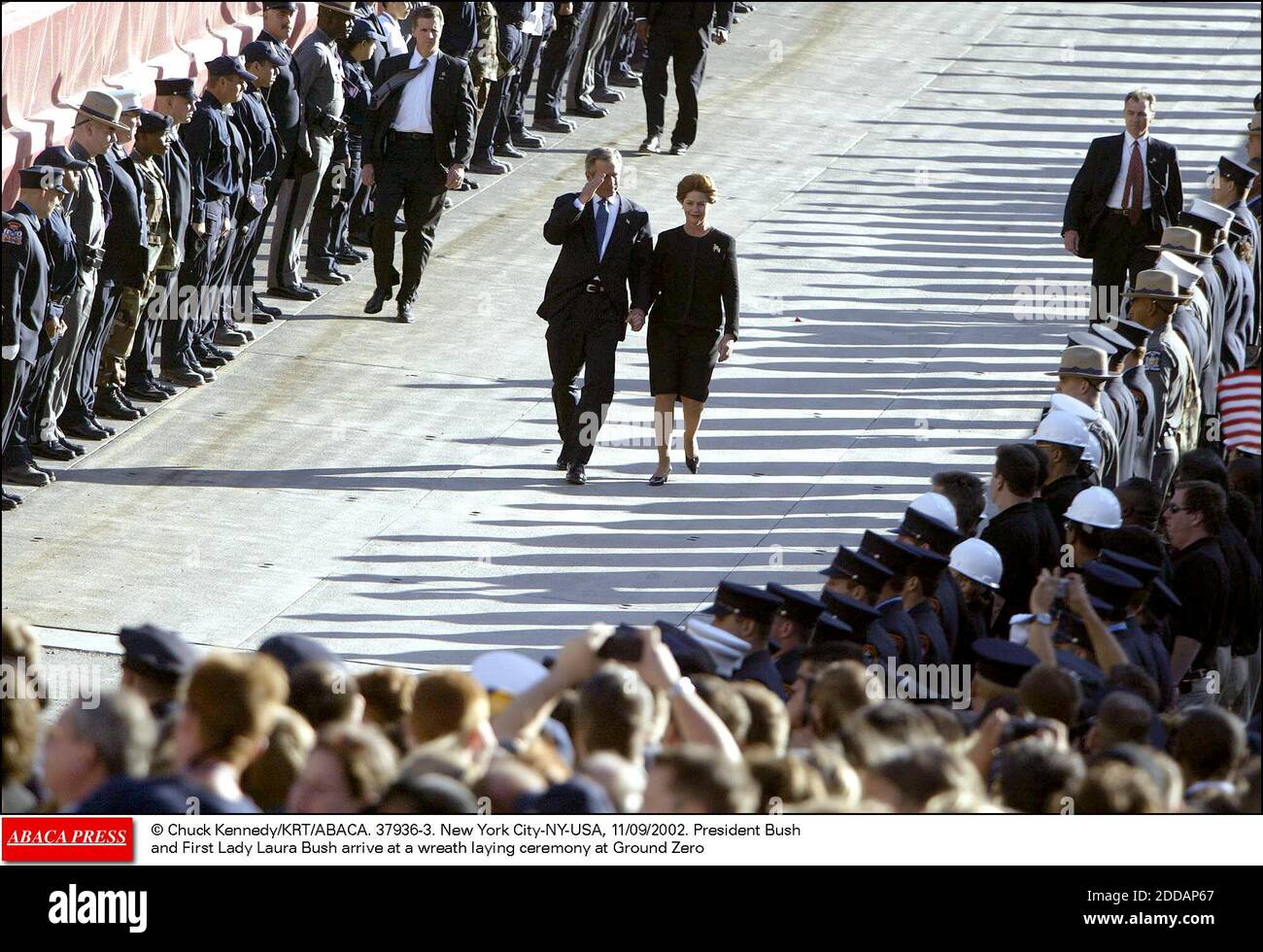 NO FILM, NO VIDEO, NO TV, NO DOCUMENTARY - © Chuck Kennedy/KRT/ABACA. 37936-3. New York City-NY-USA, 11/09/2002. President Bush and First Lady Laura Bush arrive at a wreath laying ceremony at Ground Zero Stock Photo