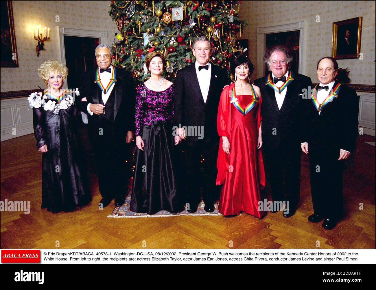NO FILM, NO VIDEO, NO TV, NO DOCUMENTARY - © Eric Draper/KRT/ABACA. 40578-1. Washington-DC-USA, 08/12/2002. President George W. Bush welcomes the recipients of the Kennedy Center Honors of 2002 to the White House. From left to right, the recipients are: actress Elizabeth Taylor, actor James Earl J Stock Photo