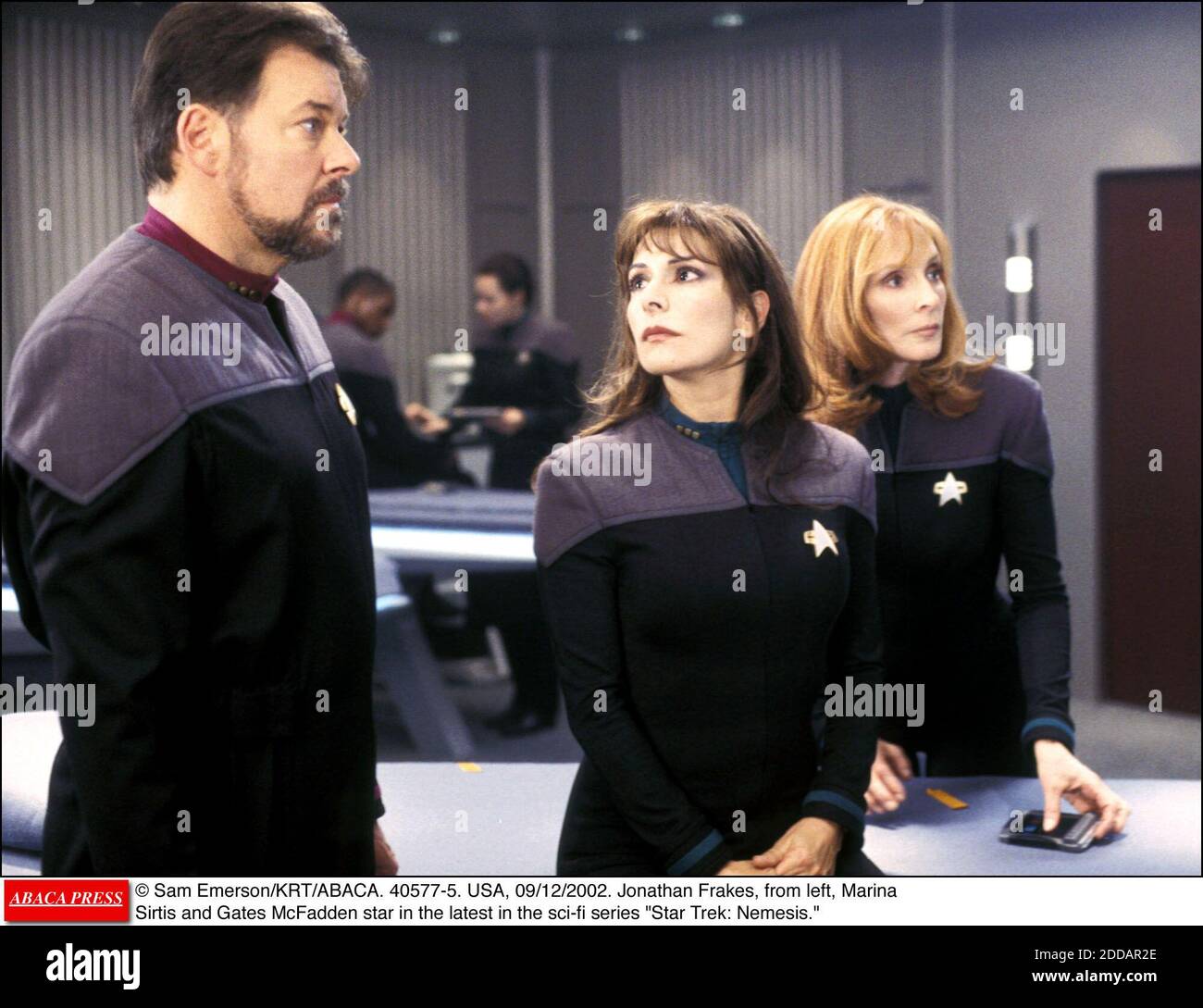 NO FILM, NO VIDEO, NO TV, NO DOCUMENTARY - © Sam Emerson/KRT/ABACA. 40577-5. USA, 09/12/2002. Jonathan Frakes, from left, Marina Sirtis and Gates McFadden star in the latest in the sci-fi series Star Trek: Nemesis. Stock Photo