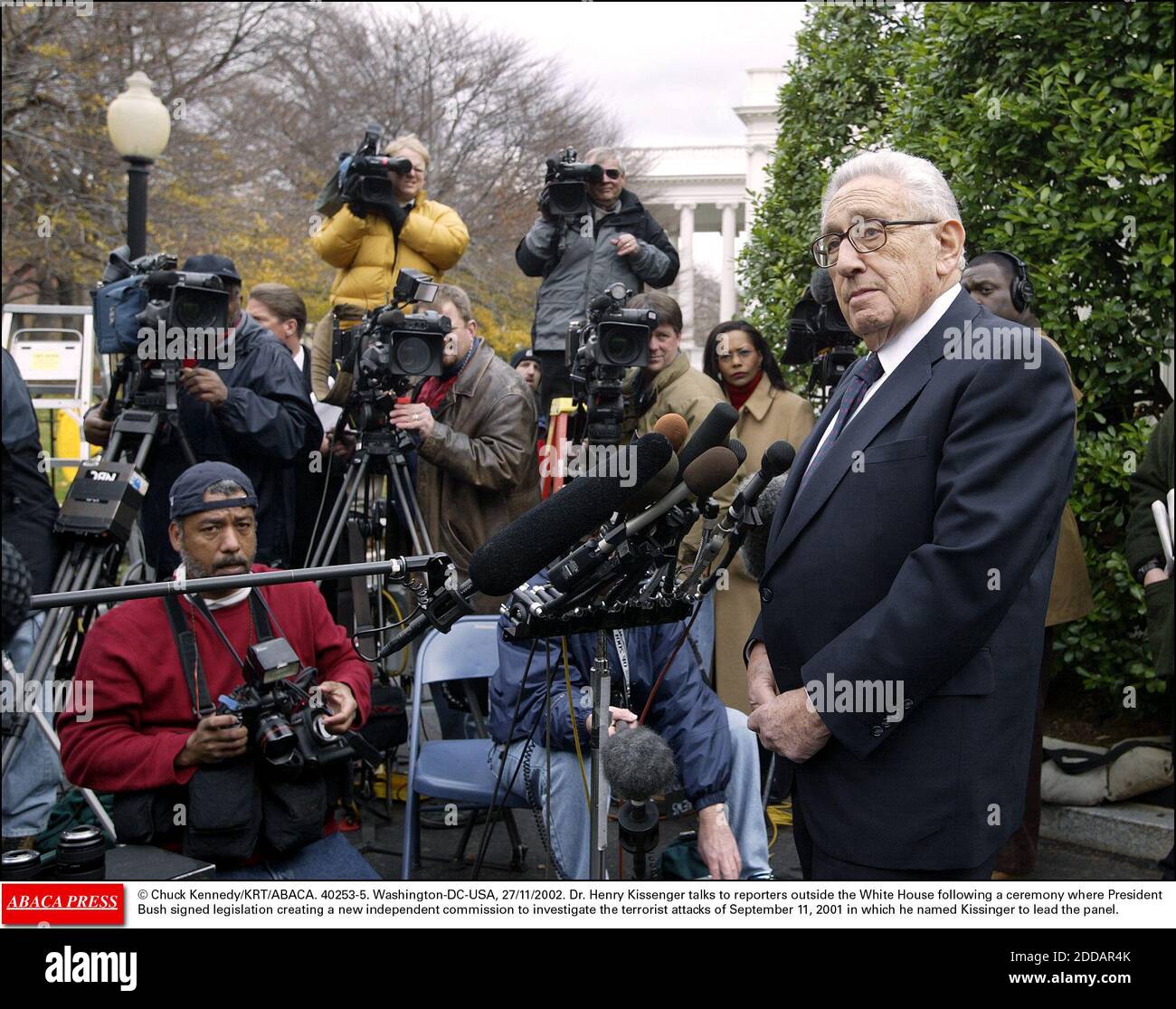 NO FILM, NO VIDEO, NO TV, NO DOCUMENTARY - © Chuck Kennedy/KRT/ABACA. 40253-5. Washington-DC-USA, 27/11/2002. Dr. Henry Kissinger talks to reporters outside the White House following a ceremony where President Bush signed legislation creating a new independent commission to investigate the terrori Stock Photo