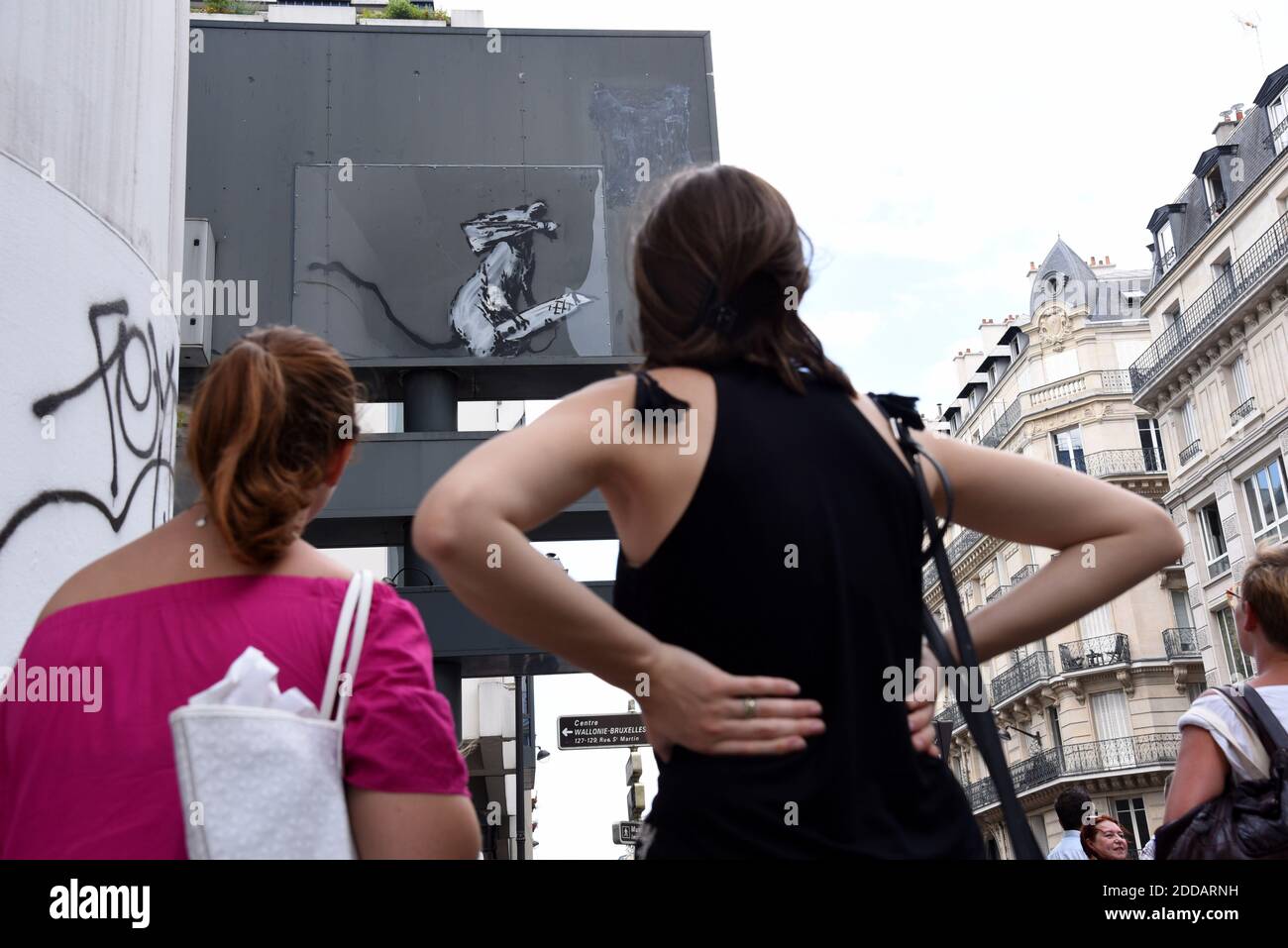A recent artwork by street artist Banksy is pictured in Paris, France, on June 29, 2018, Street artist Banksy has confirmed that he 'blitzed' Paris with up to a dozen murals as a tribute to the May 1968 uprising and even taking aim at the French government's hard line on migrants. Stencilled images in the style of the mysterious British graffiti star began appearing on walls across the French capital last week. Photo by Alain Apaydin/ABACAPRESS.COM Stock Photo