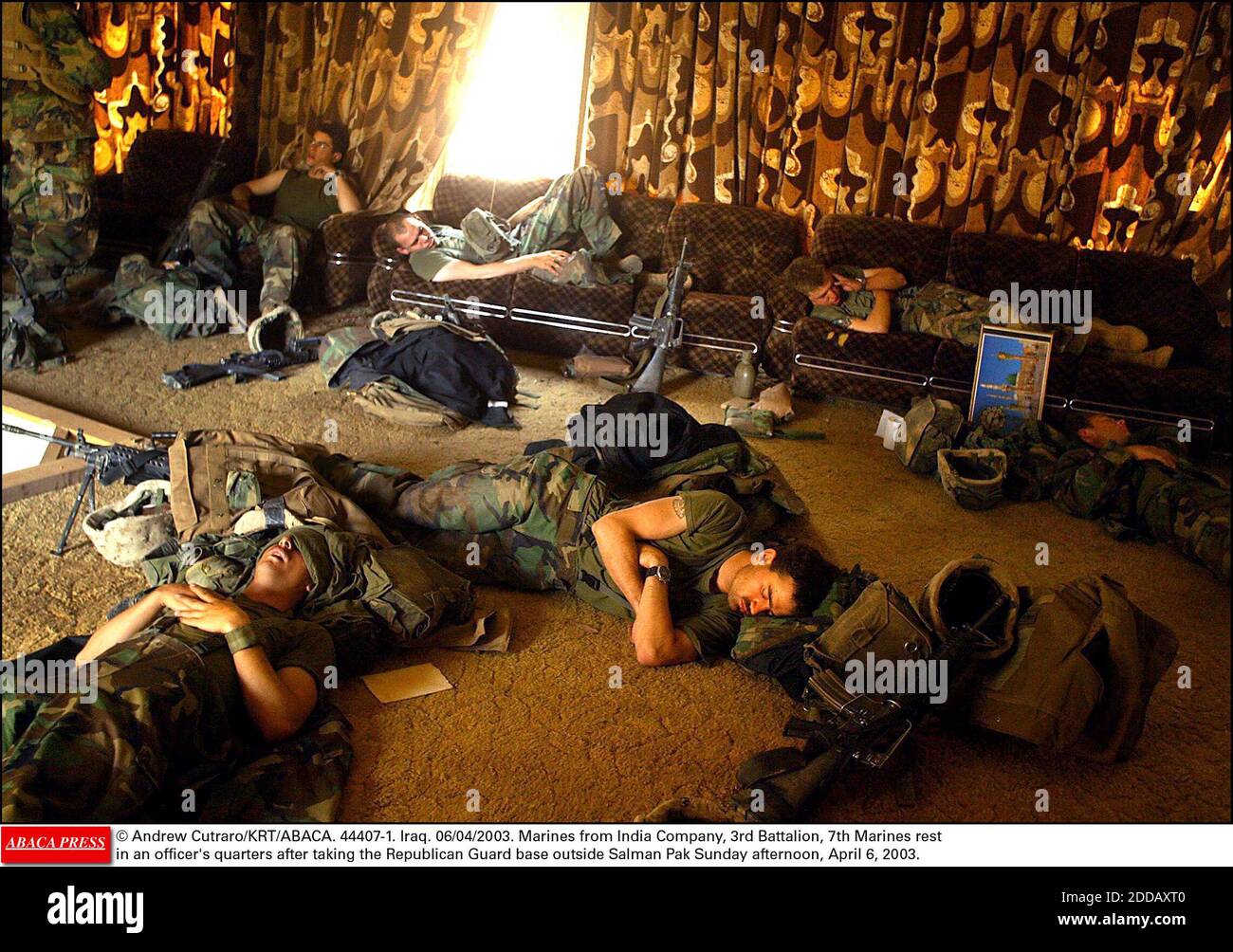 NO FILM, NO VIDEO, NO TV, NO DOCUMENTARY - © Andrew Cutraro/KRT/ABACA. 44407-1. Iraq. 06/04/2003. Marines from India Company, 3rd Battalion, 7th Marines rest in an officer's quarters after taking the Republican Guard base outside Salman Pak Sunday afternoon, April 6, 2003. Stock Photo