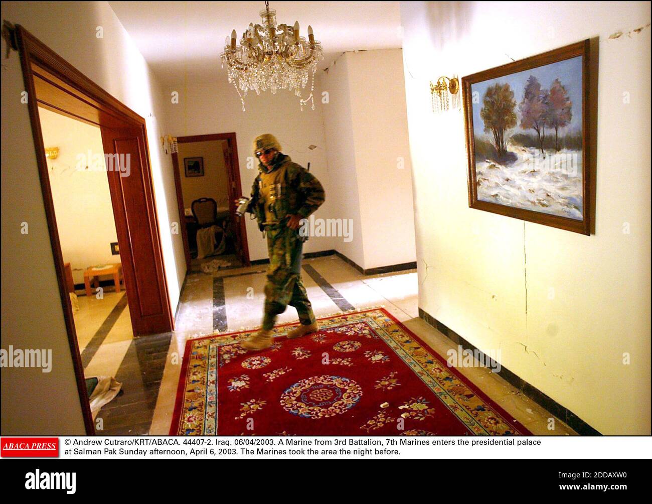 NO FILM, NO VIDEO, NO TV, NO DOCUMENTARY - © Andrew Cutraro/KRT/ABACA. 44407-2. Iraq. 06/04/2003. A Marine from 3rd Battalion, 7th Marines enters the presidential palace at Salman Pak Sunday afternoon, April 6, 2003. The Marines took the area the night before. Stock Photo