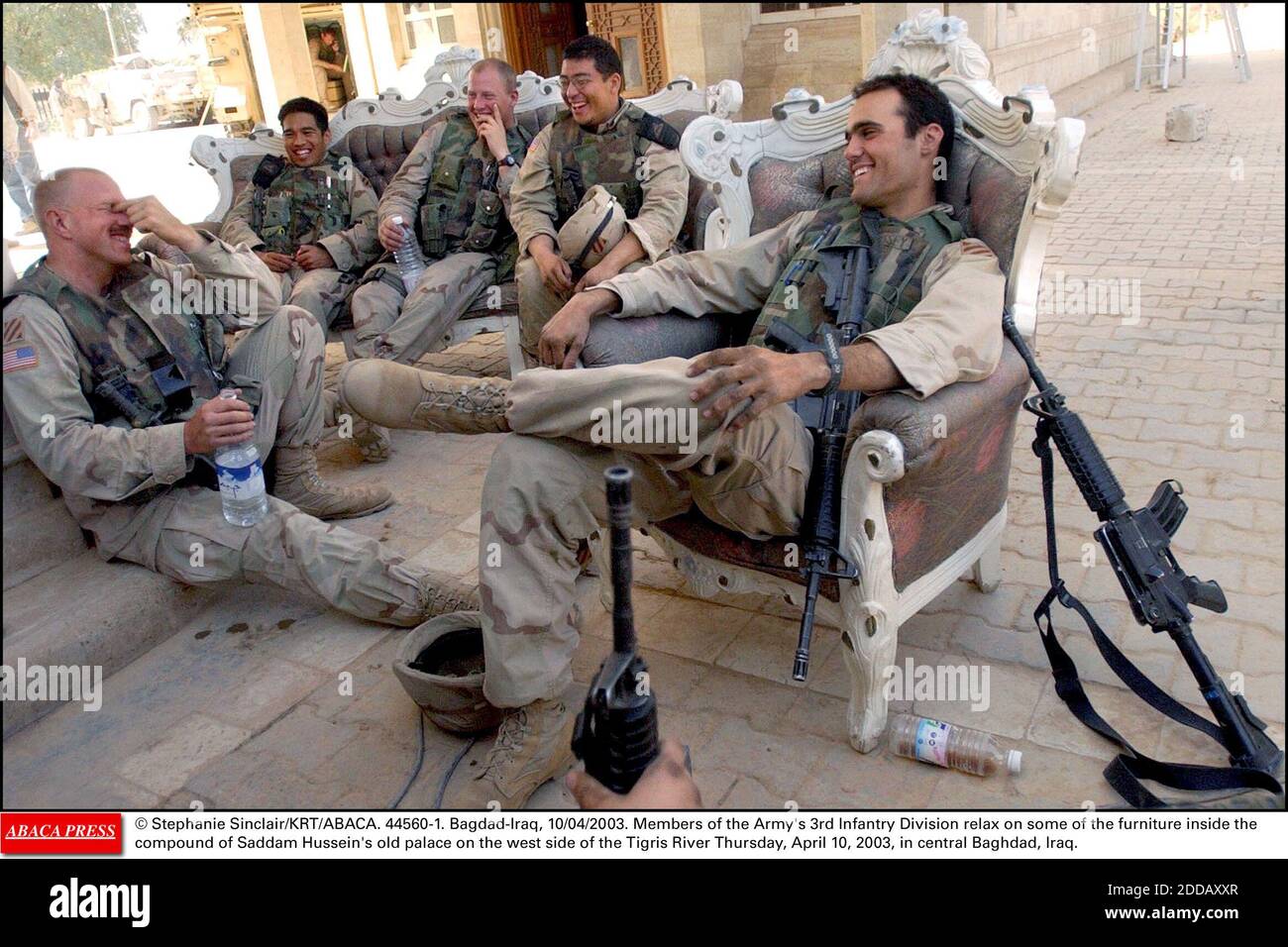 https://c8.alamy.com/comp/2DDAXXR/no-film-no-video-no-tv-no-documentary-stephanie-sinclairkrtabaca-44560-1-baghdad-iraq-10042003-members-of-the-armys-3rd-infantry-division-relax-on-some-of-the-furniture-inside-the-compound-of-saddam-husseins-old-palace-on-the-west-side-of-the-tigris-river-thursday-april-10-2003-2DDAXXR.jpg