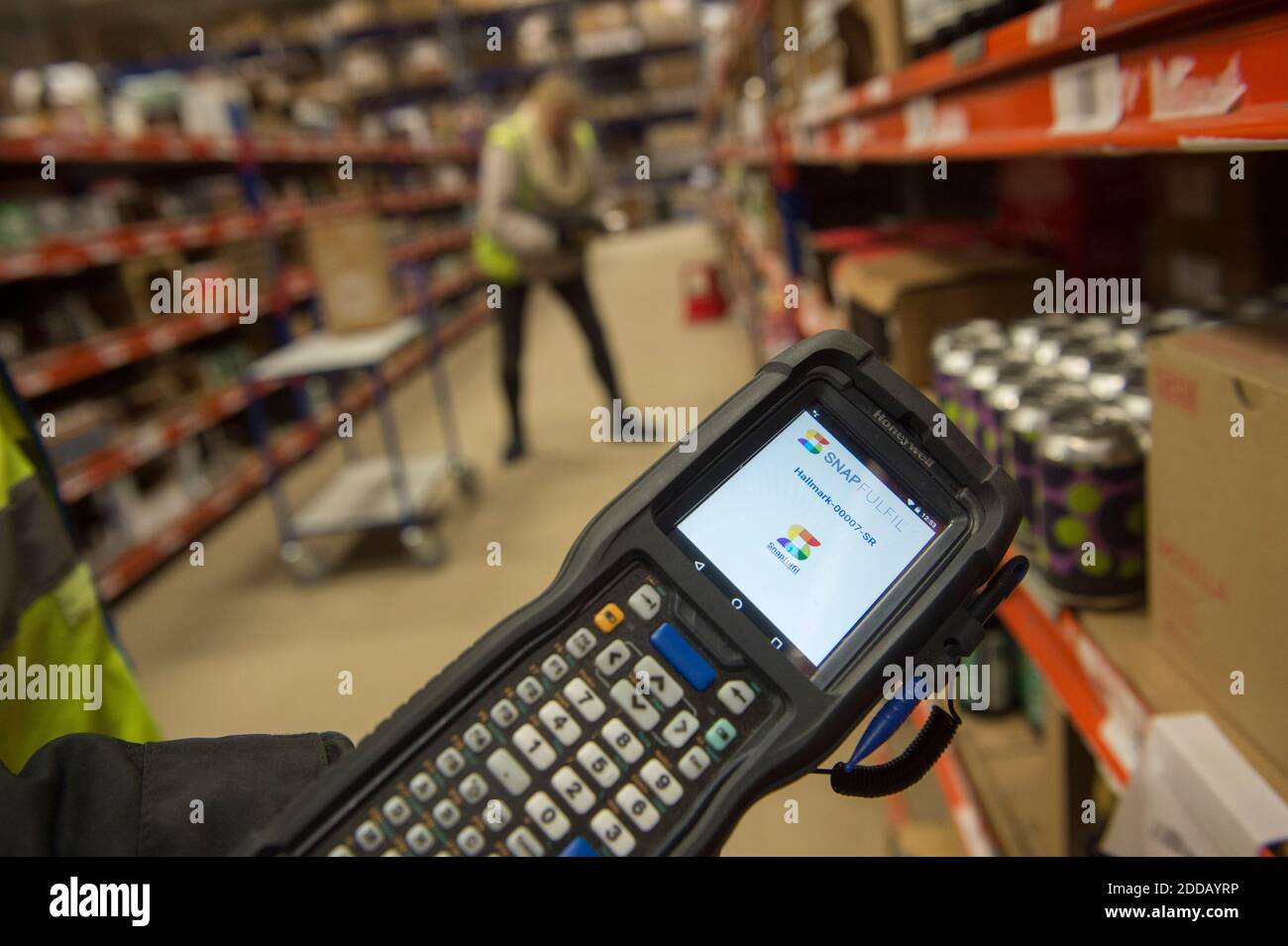 Hallmark Distribution using Snapfulfil system for picking craft beers in their warehouse. picking and scanning ale electronically Stock Photo