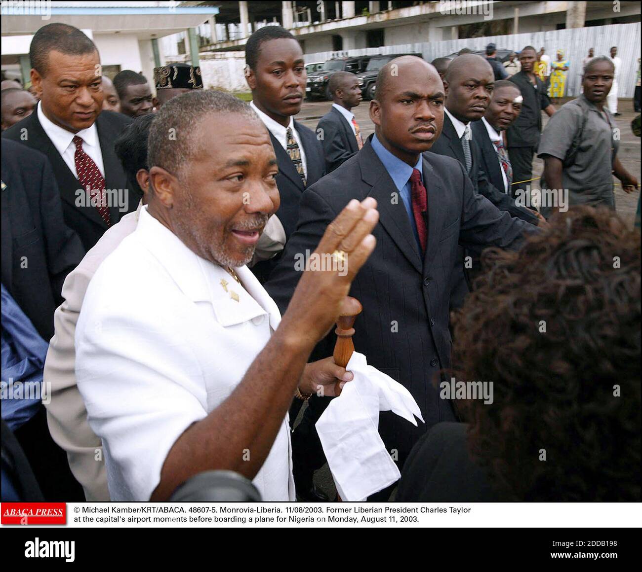 NO FILM, NO VIDEO, NO TV, NO DOCUMENTARY - © Michael Kamber/KRT/ABACA. 48607-5. Monrovia-Liberia. 11/08/2003. Former Liberian President Charles Taylor at the capital's airport moments before boarding a plane for Nigeria on Monday, August 11, 2003. Stock Photo