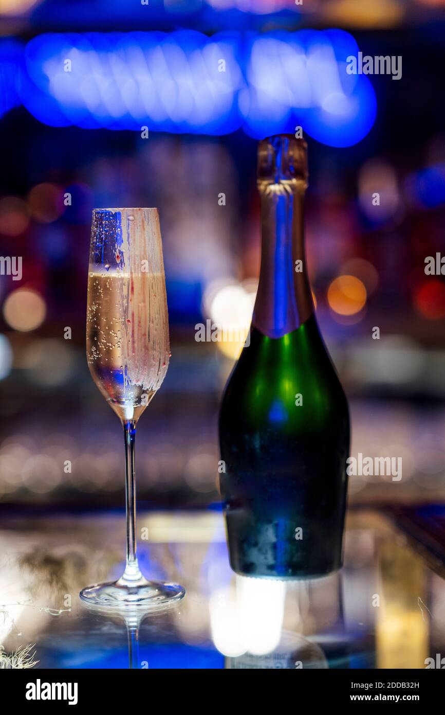Glass and bottle of champagne Stock Photo Alamy