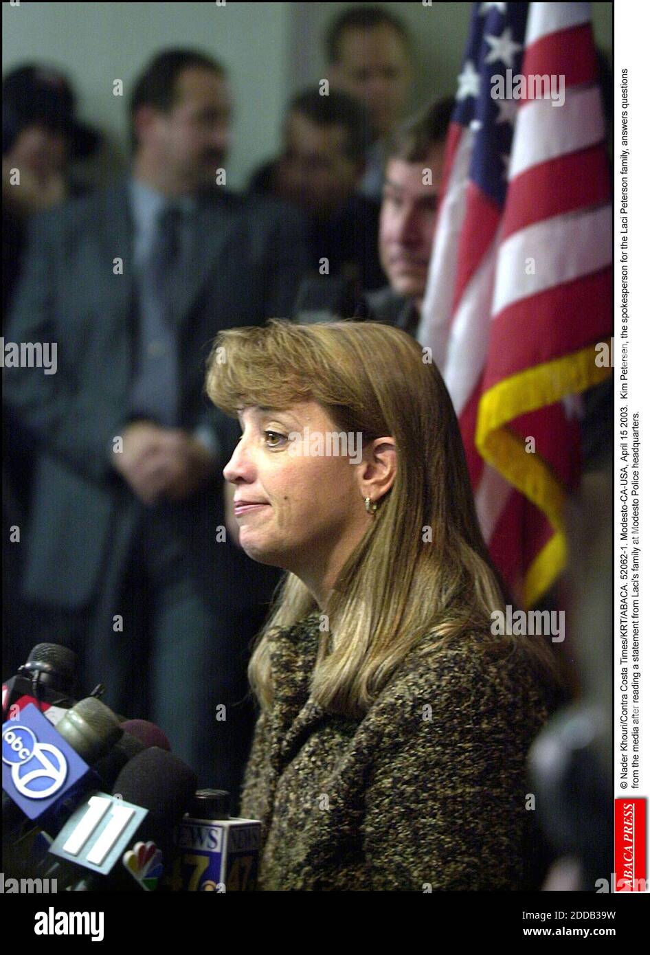 NO FILM, NO VIDEO, NO TV, NO DOCUMENTARY - © Nader Khouri/Contra Costa Times/KRT/ABACA. 52062-1. Modesto-CA-USA, April 15 2003. Kim Petersen, the spokesperson for the Laci Peterson family, answers questions from the media after reading a statement from Laci's family at Modesto Police headquarters. Stock Photo
